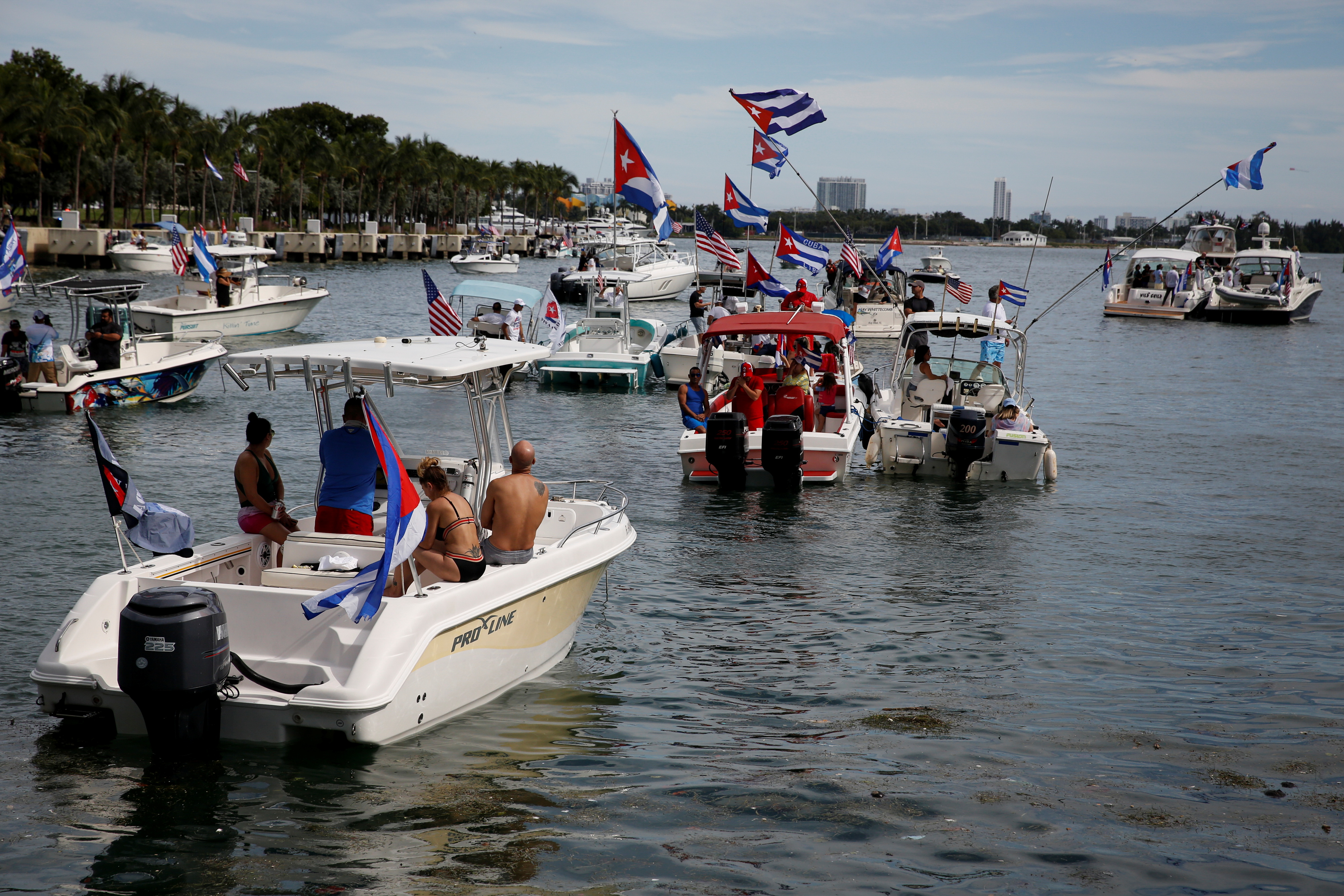 People on boats attend a rally ahead of an opposition demonstration in Cuba, in Miami, Florida, U.S. November 14, 2021. REUTERS/Marco Bello