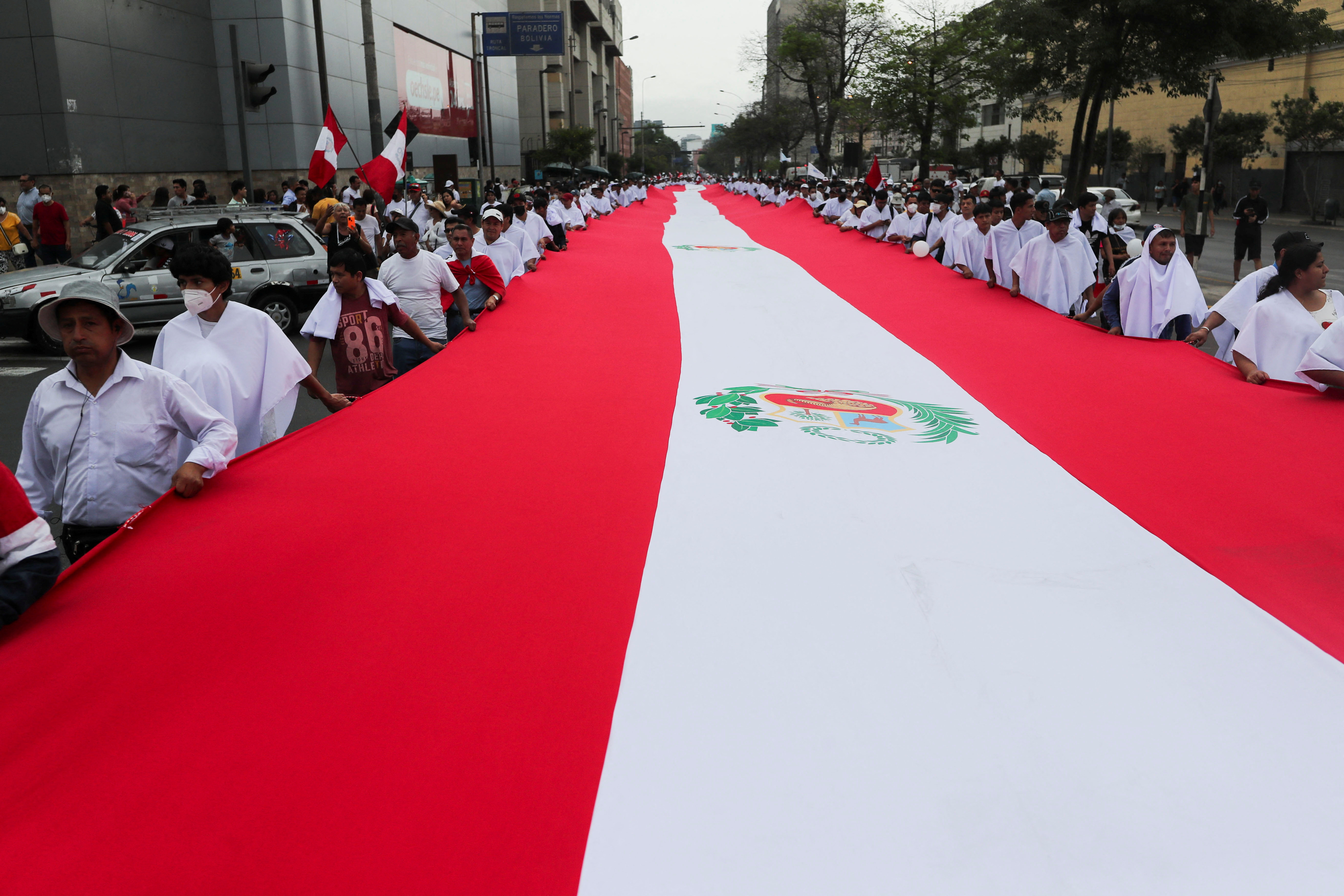 March asking for peace following the violent outbreak after the ousting and arrest of former President Pedro Castillo, in Lima