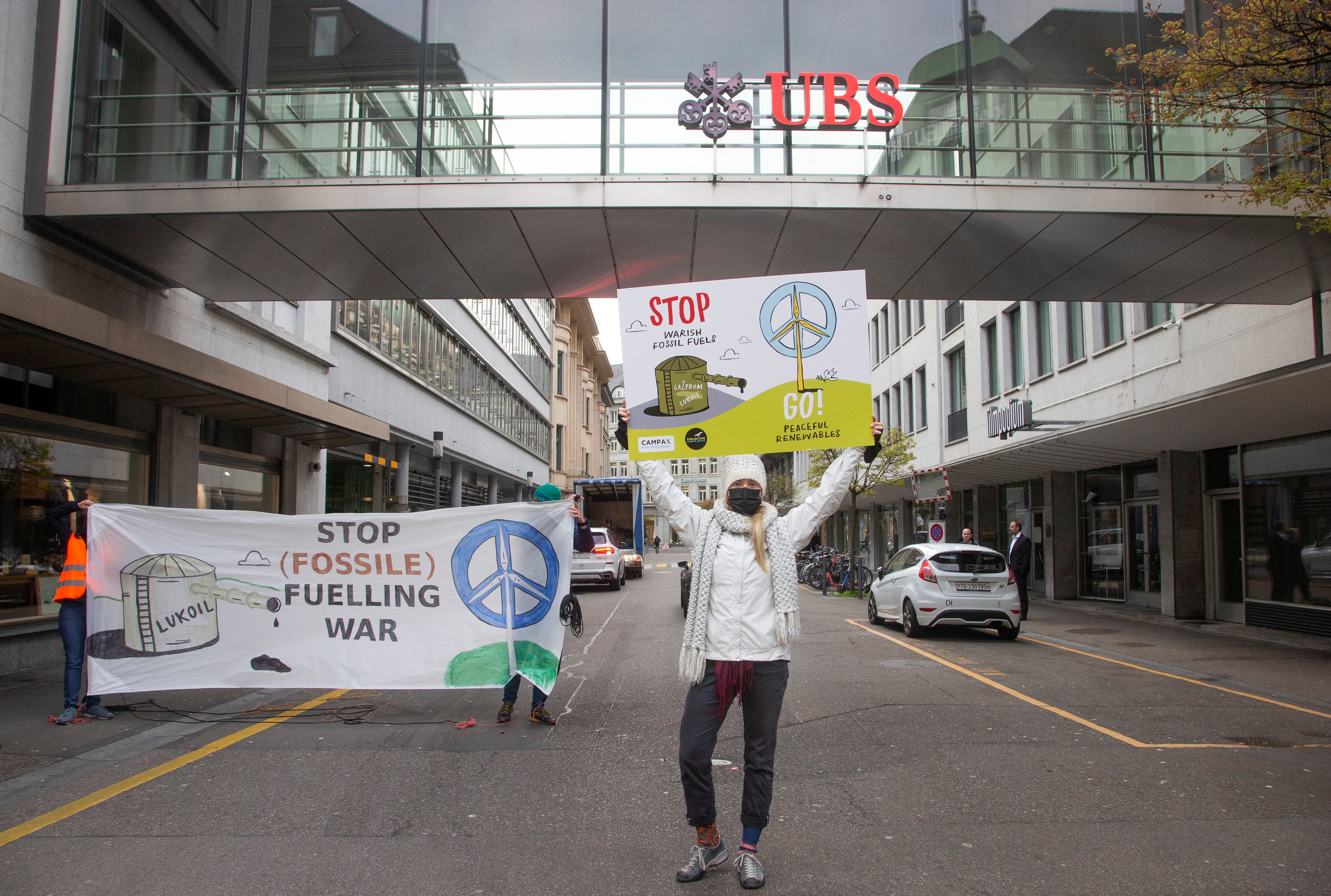 Climate activists of Campax and Collective Climate Justice protest ahead of a UBS general shareholder meeting in Zurich