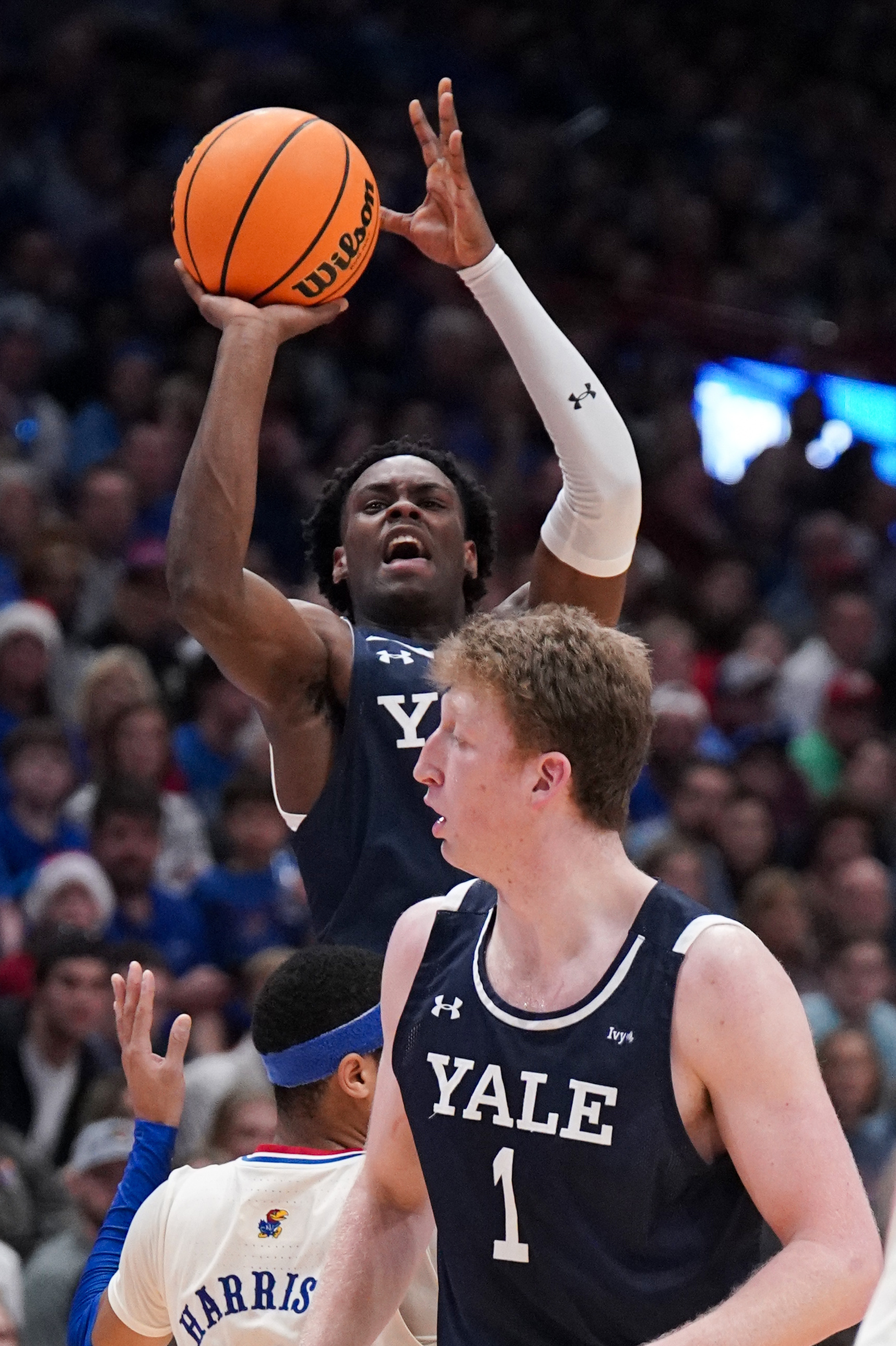 Kevin McCullar (34 Points) Helps No. 2 Kansas Escape Pesky Yale | Reuters