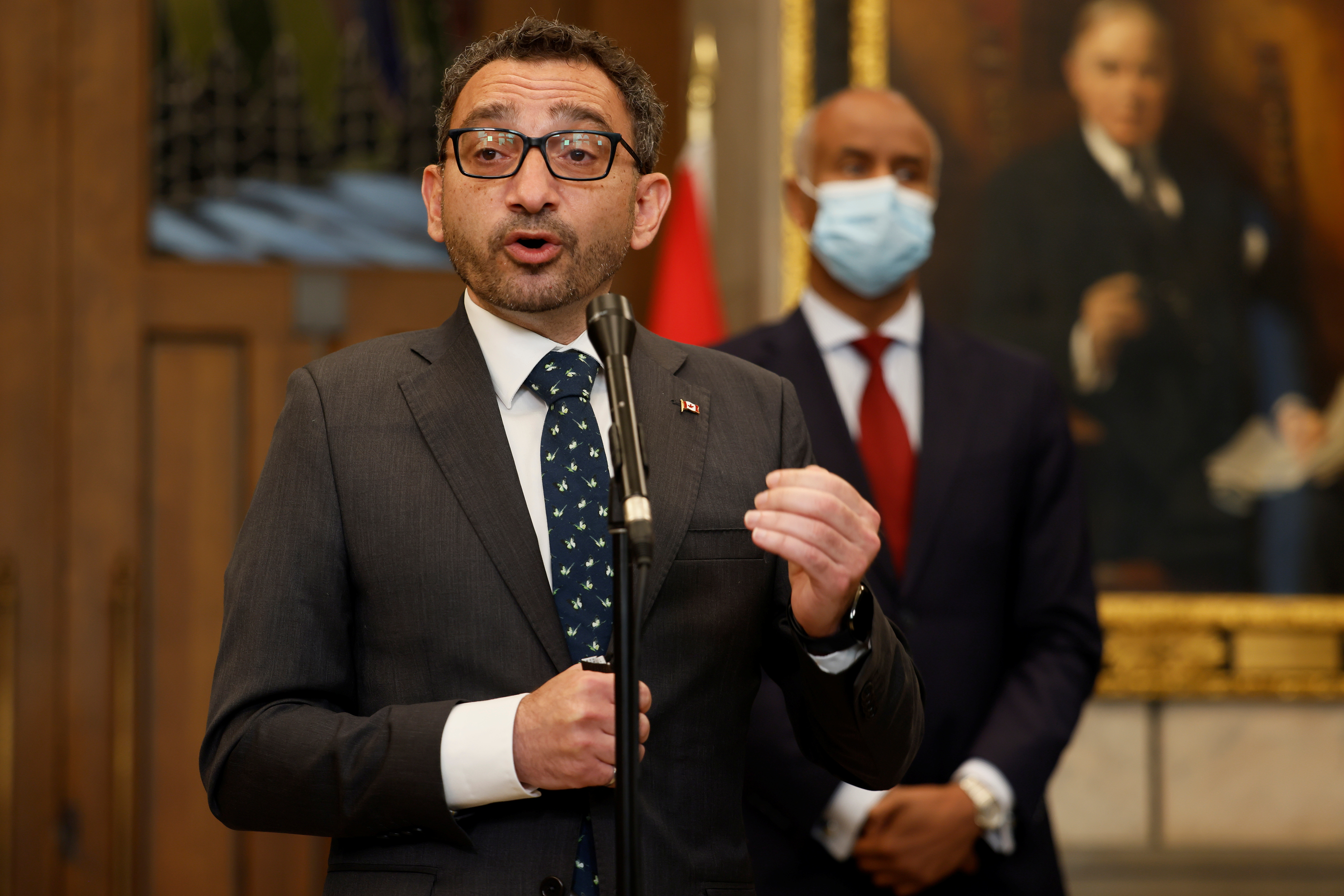 Canada's Minister of Transport Omar Alghabra speaks during a press conference on Parliament Hill in Ottawa