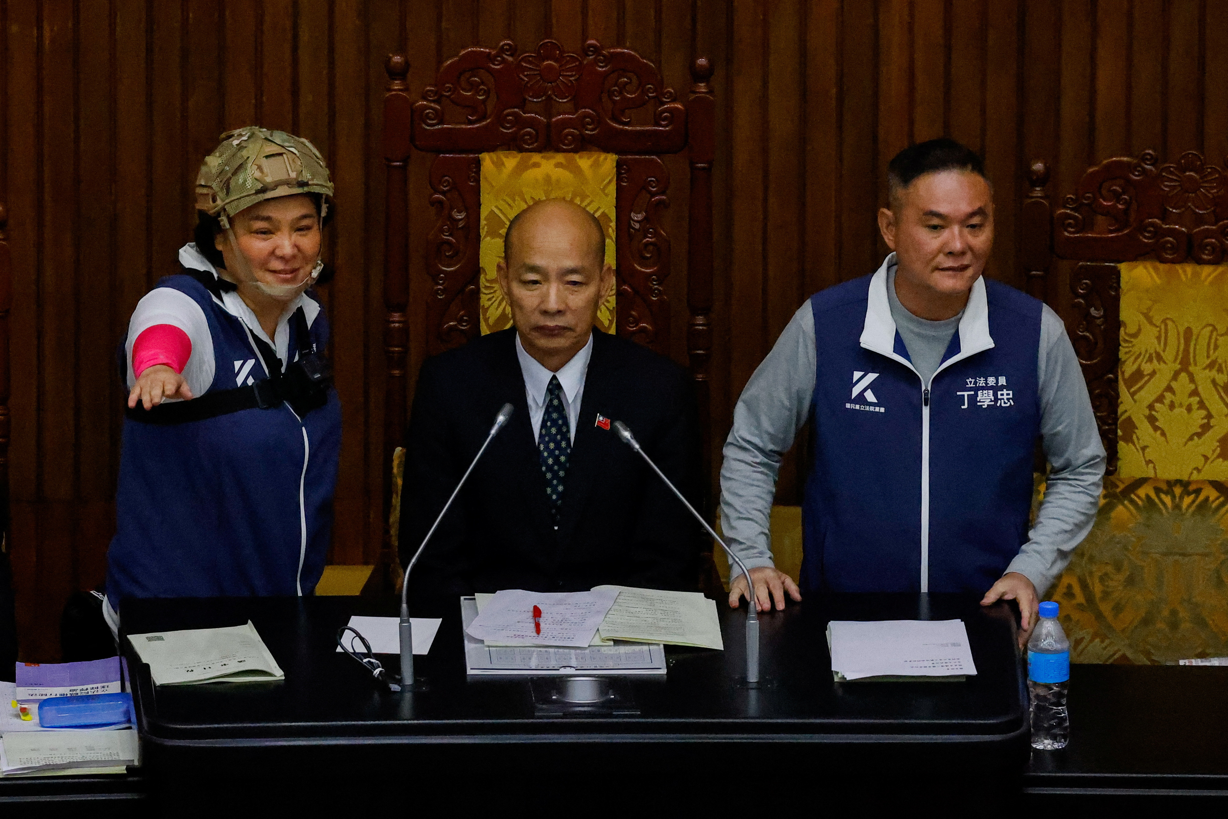 Jessica Chen, who represents Kinmen as a lawmaker for Taiwan's largest opposition party the Kuomintang stands next to the Parliament Speaker Han Kuo-yu during a parliamentary session in Taipei