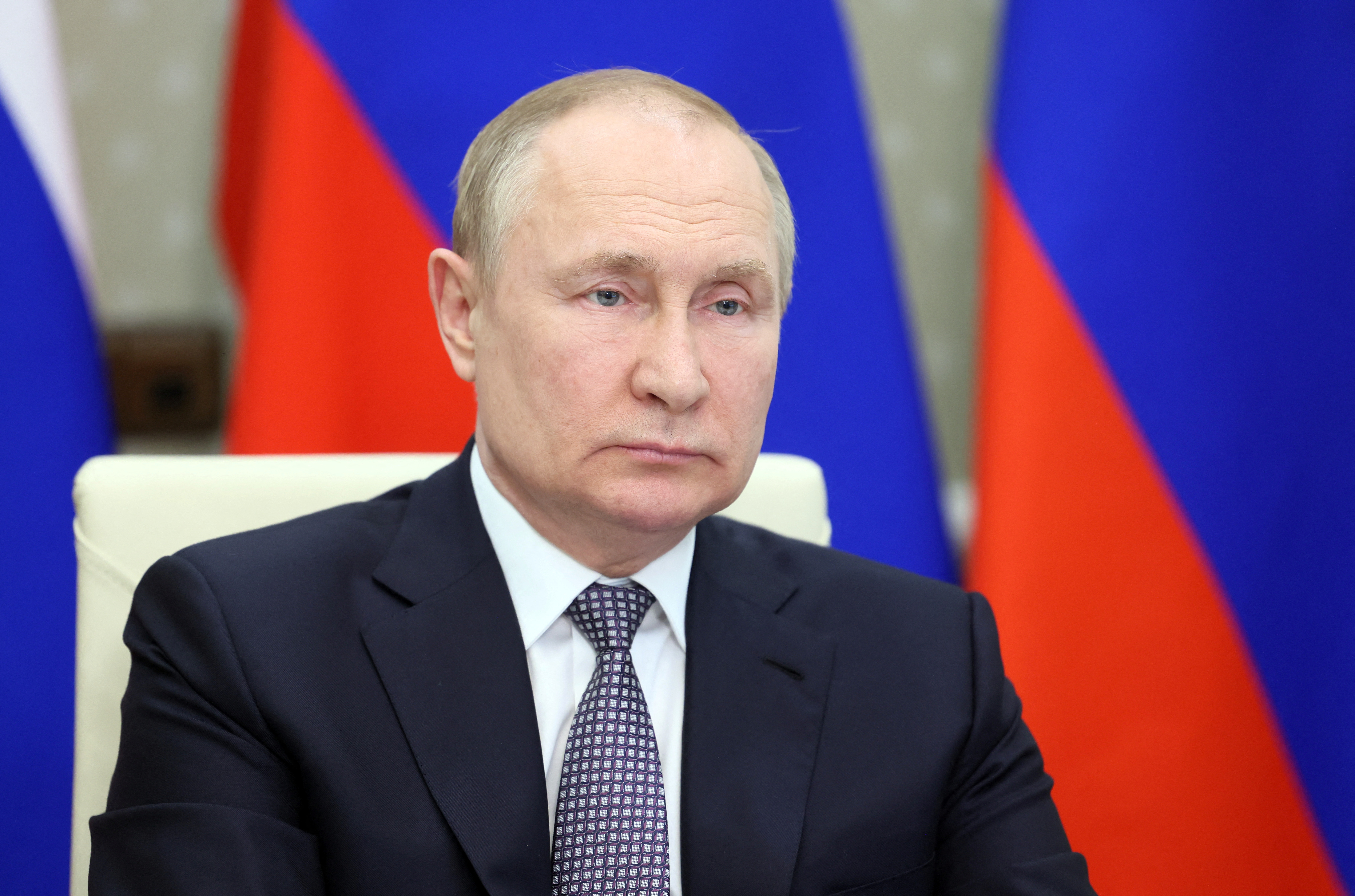 Russian President Vladimir Putin attends a BRICS+ meeting via a video link in the Moscow region