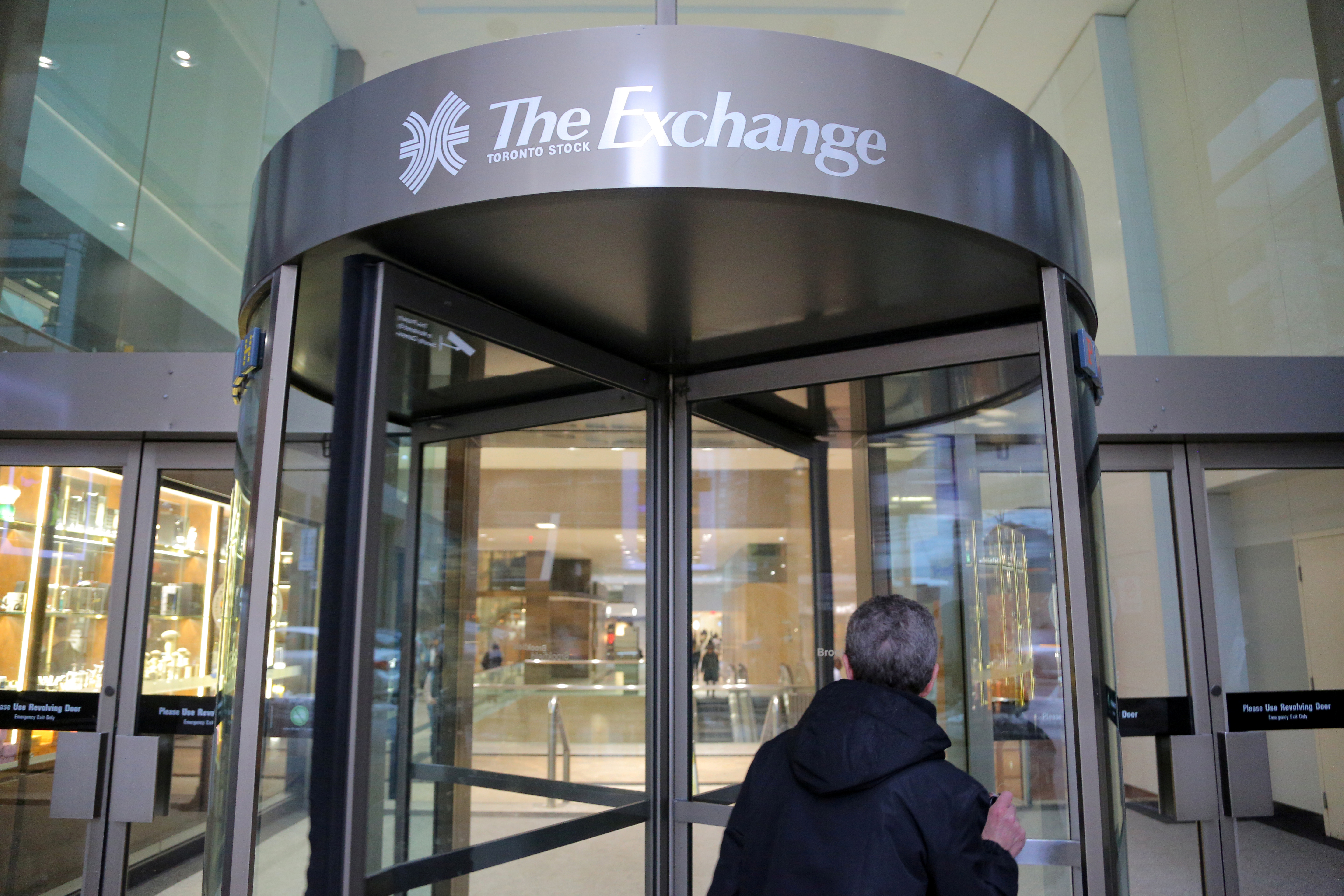 A Toronto Stock Exchange sign adorns a doorway at the Exchange Tower building in Toronto