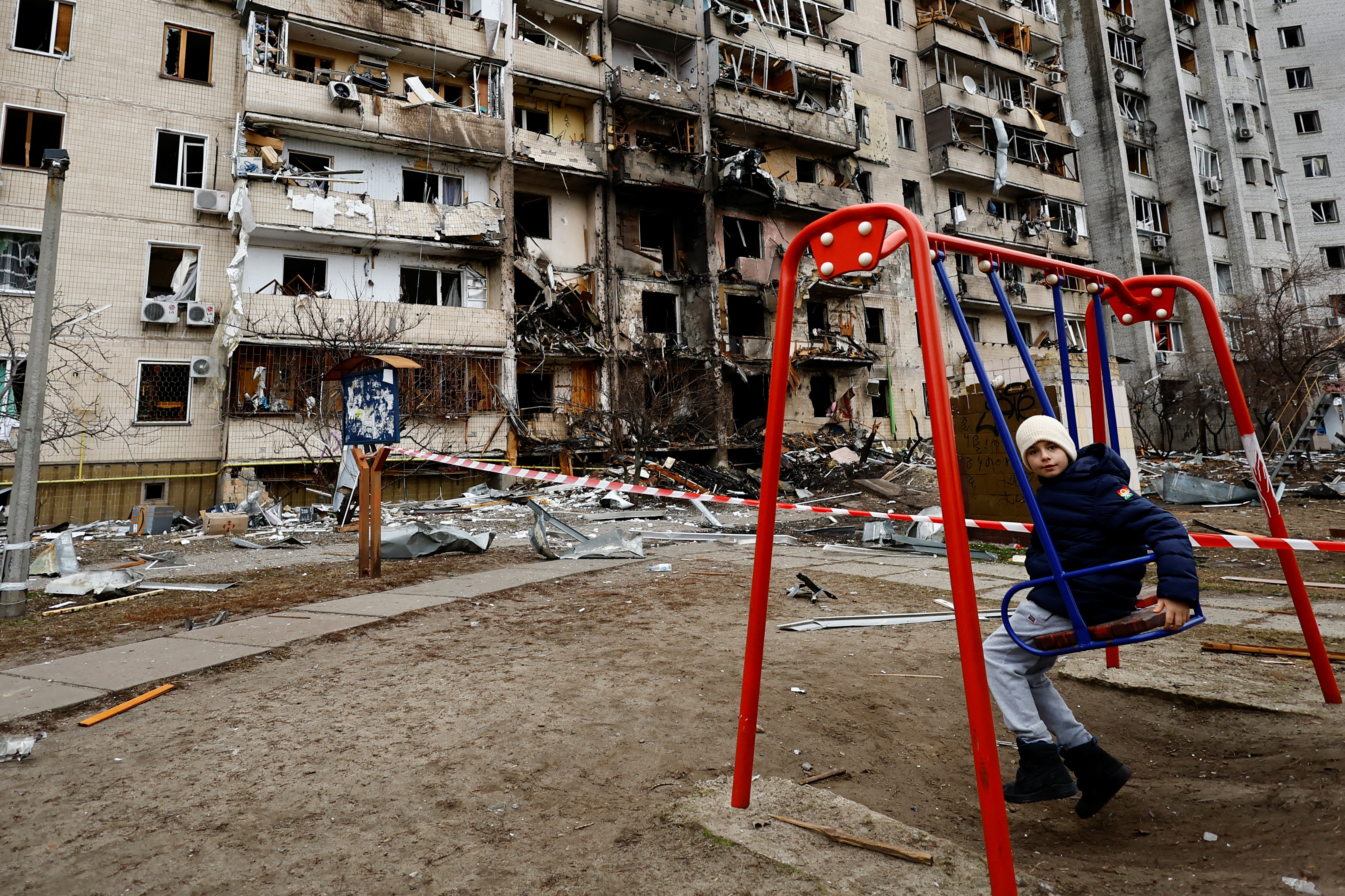 A residential building is damaged, after Russia launched a massive military operation against Ukraine, in Kyiv