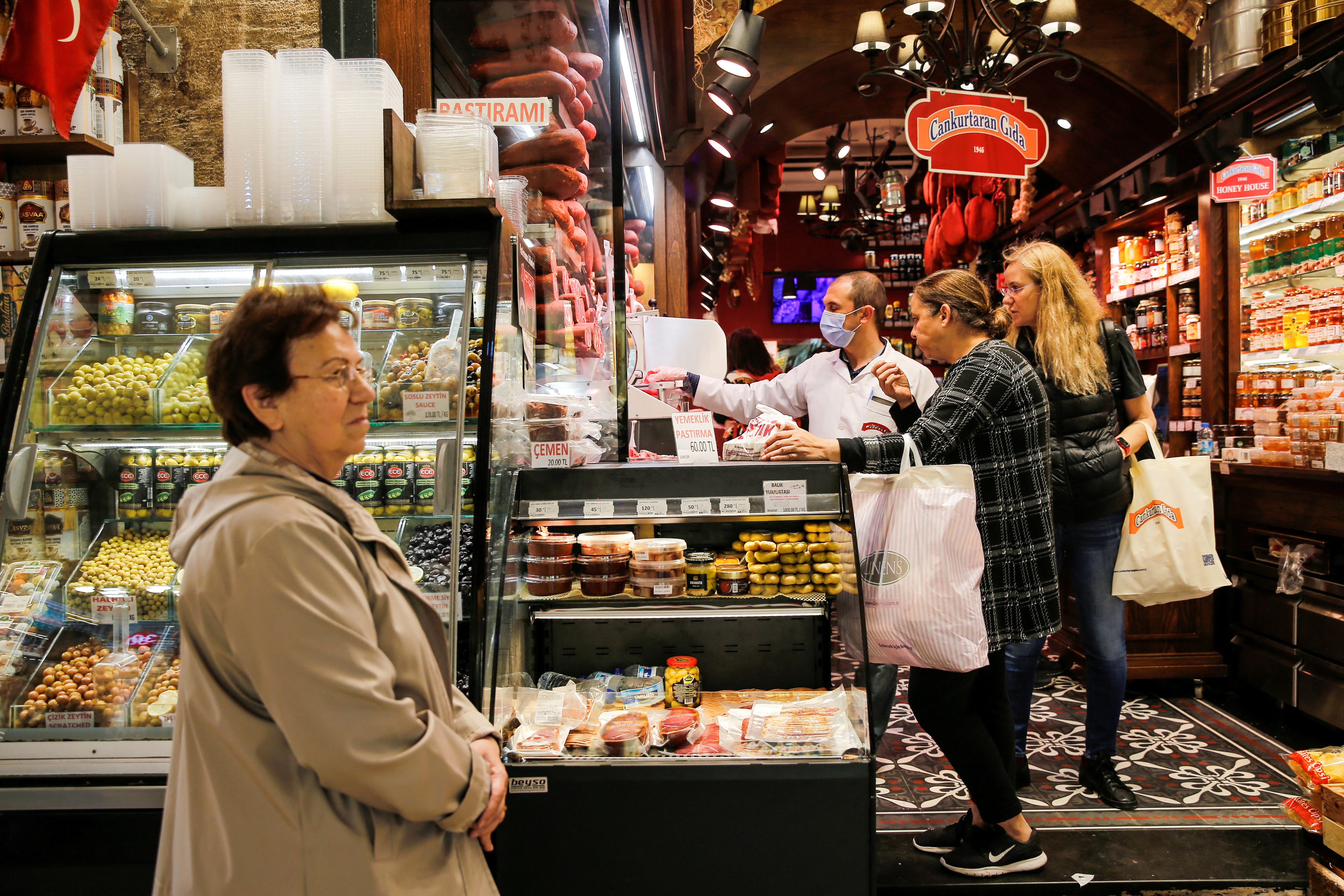 People shop at Eminonu district in Istanbul