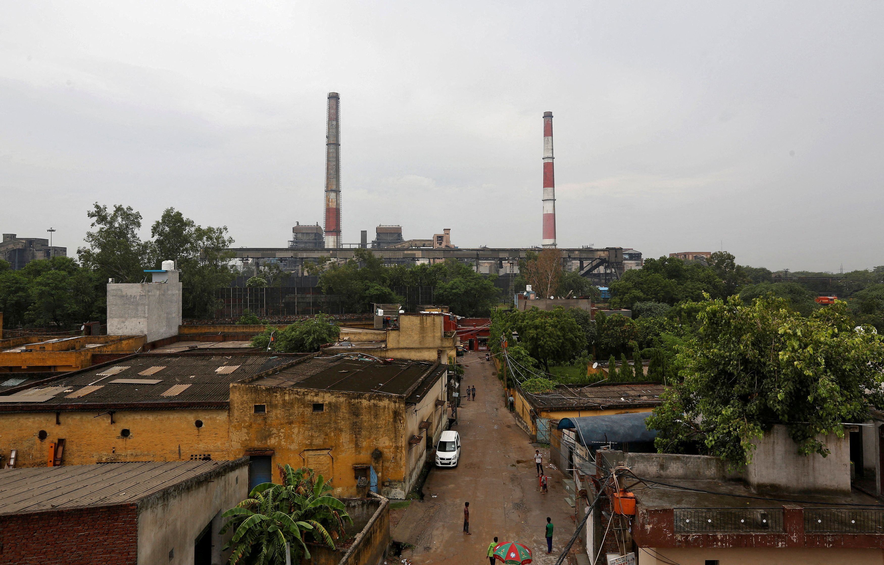Chimneys of a coal-fired power plant are pictured in New Delhi, India