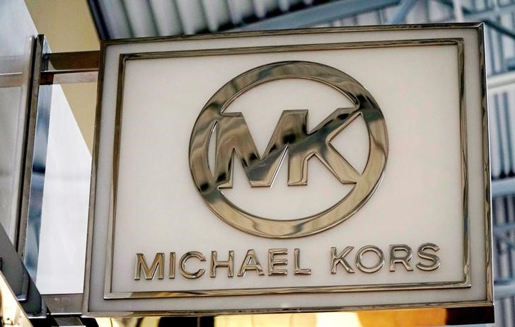 The logo of Michael Kors is seen outside a store in Lakewood