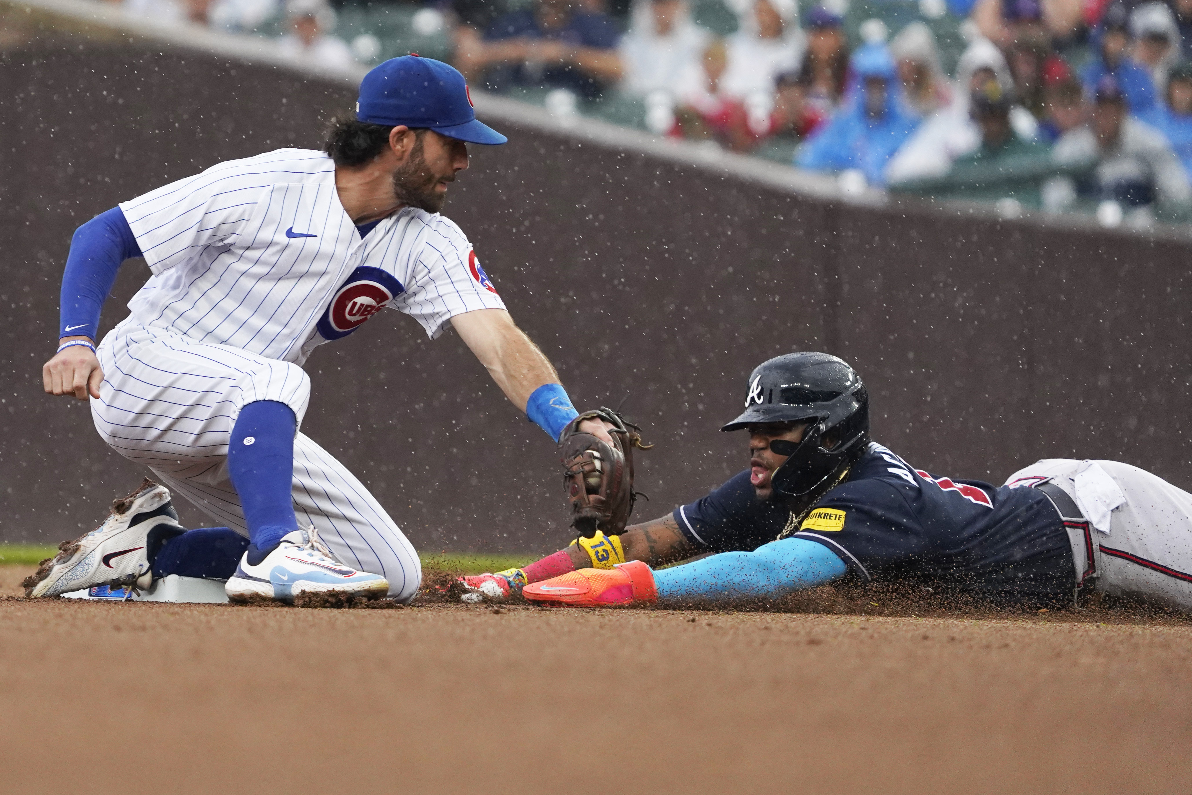Swanson and Candelario go deep as the Cubs hold off the Braves 8-6 at rainy  Wrigley - ABC News