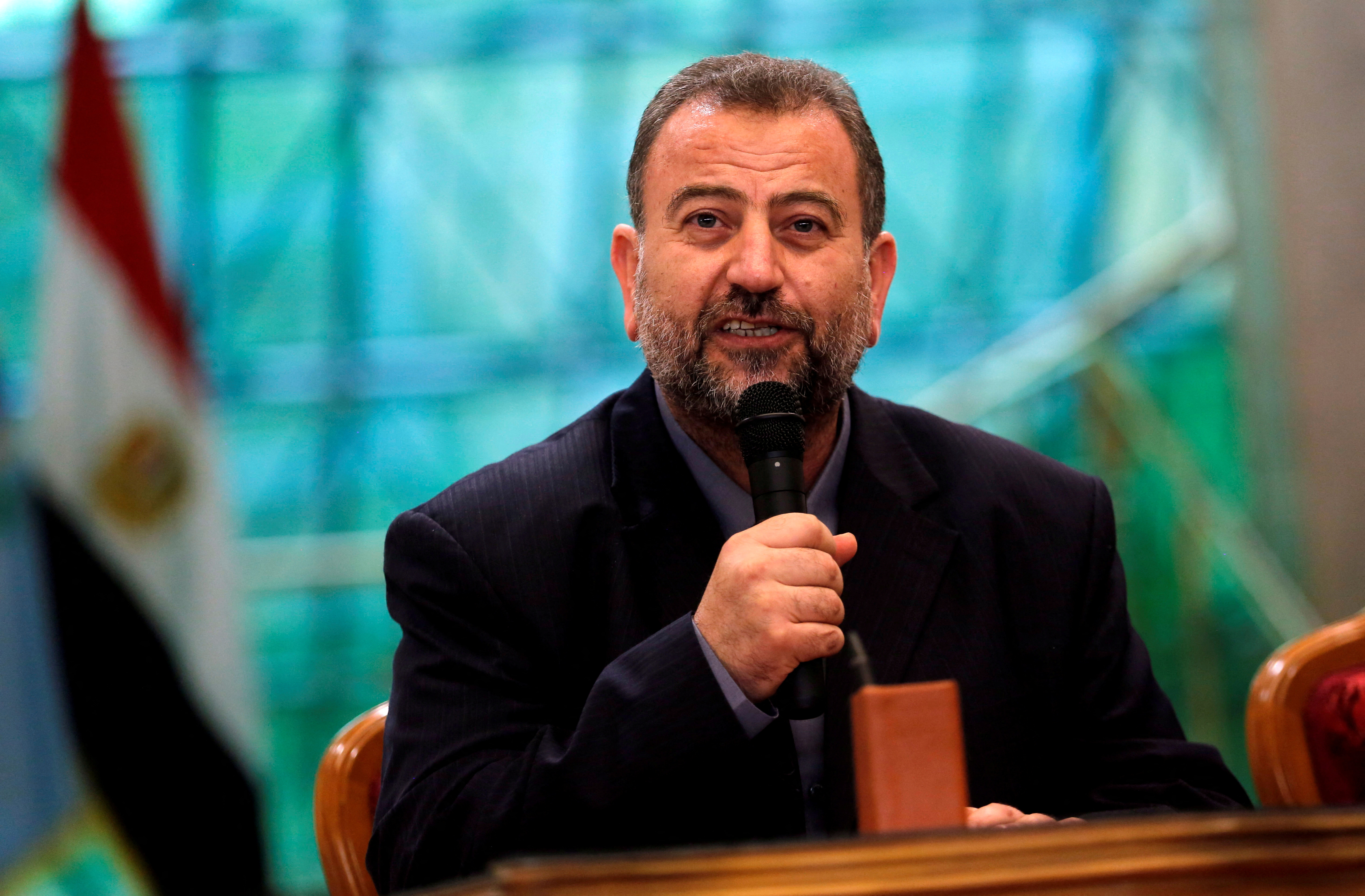 Head of Hamas delegation Saleh al-Arouri speaks during a reconciliation deal signing ceremony in Cairo