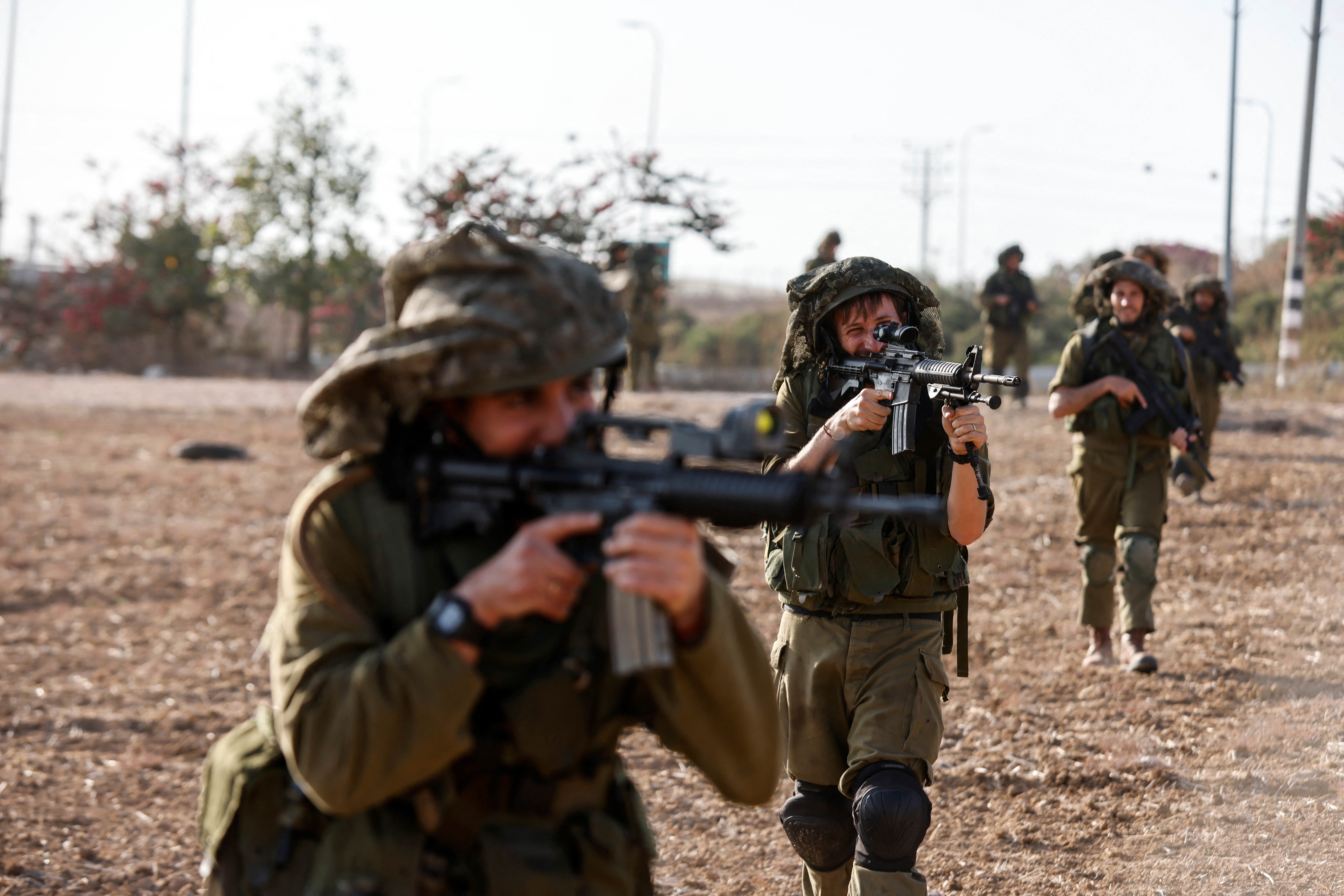 Israeli soldiers are stationed near Israel's border with Gaza in southern Israel