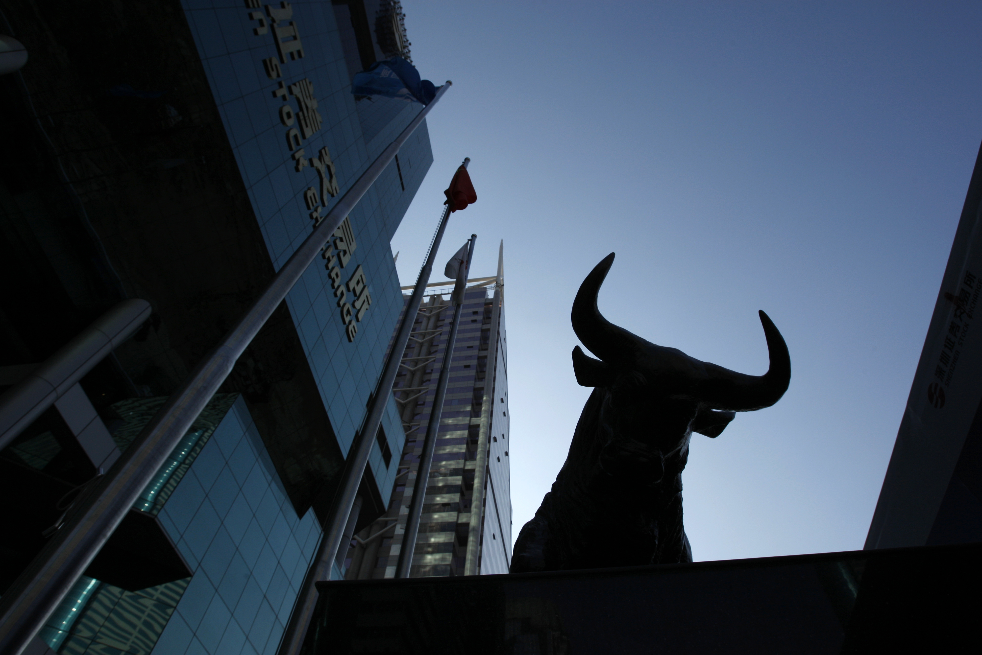 A sculpture of a bull is seen outside the Shenzhen Stock Exchange in the southern Chinese city of Shenzhen