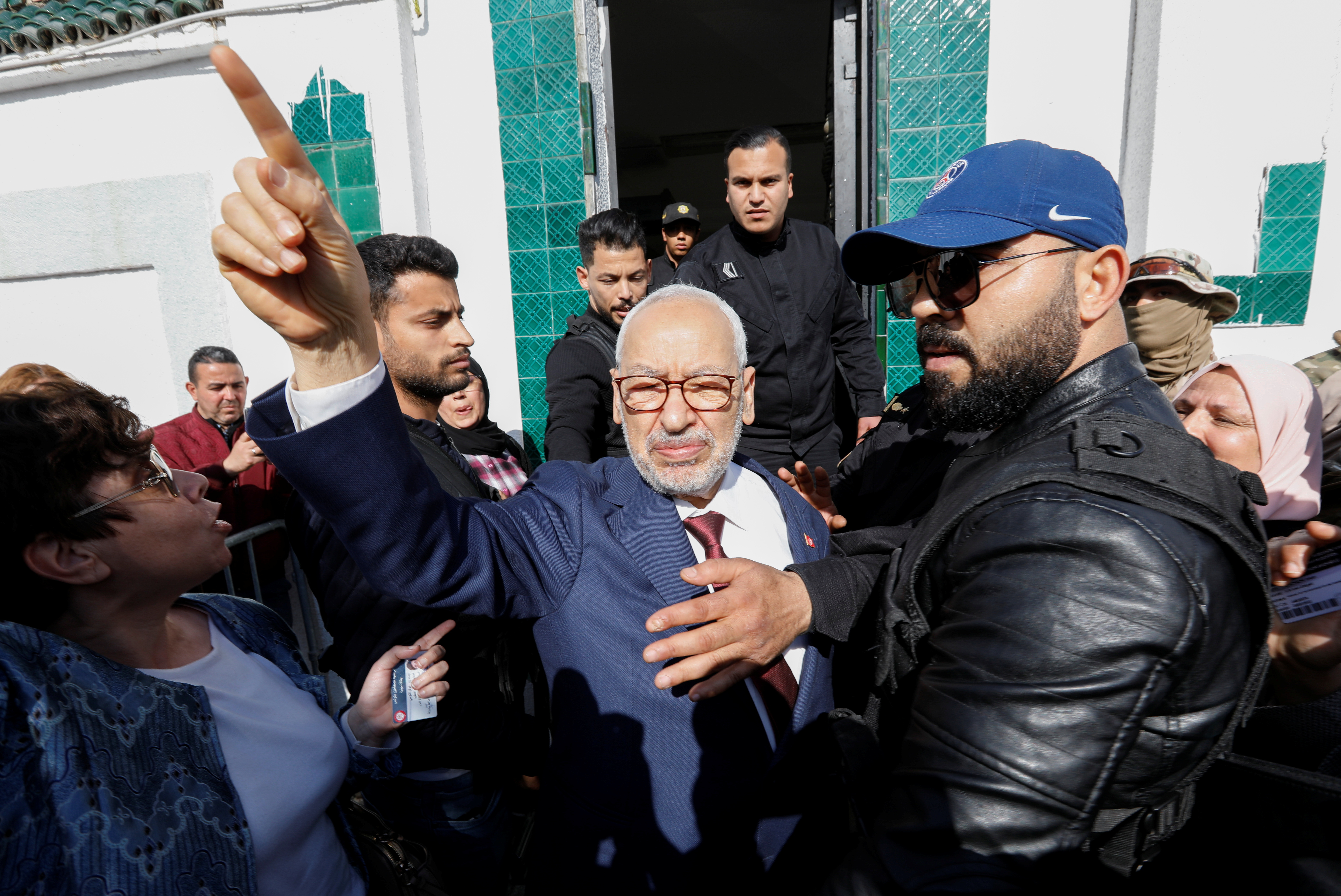 Tunisian anti-terrorism police summoned the country's main opposition figure for questioning, in Tunis