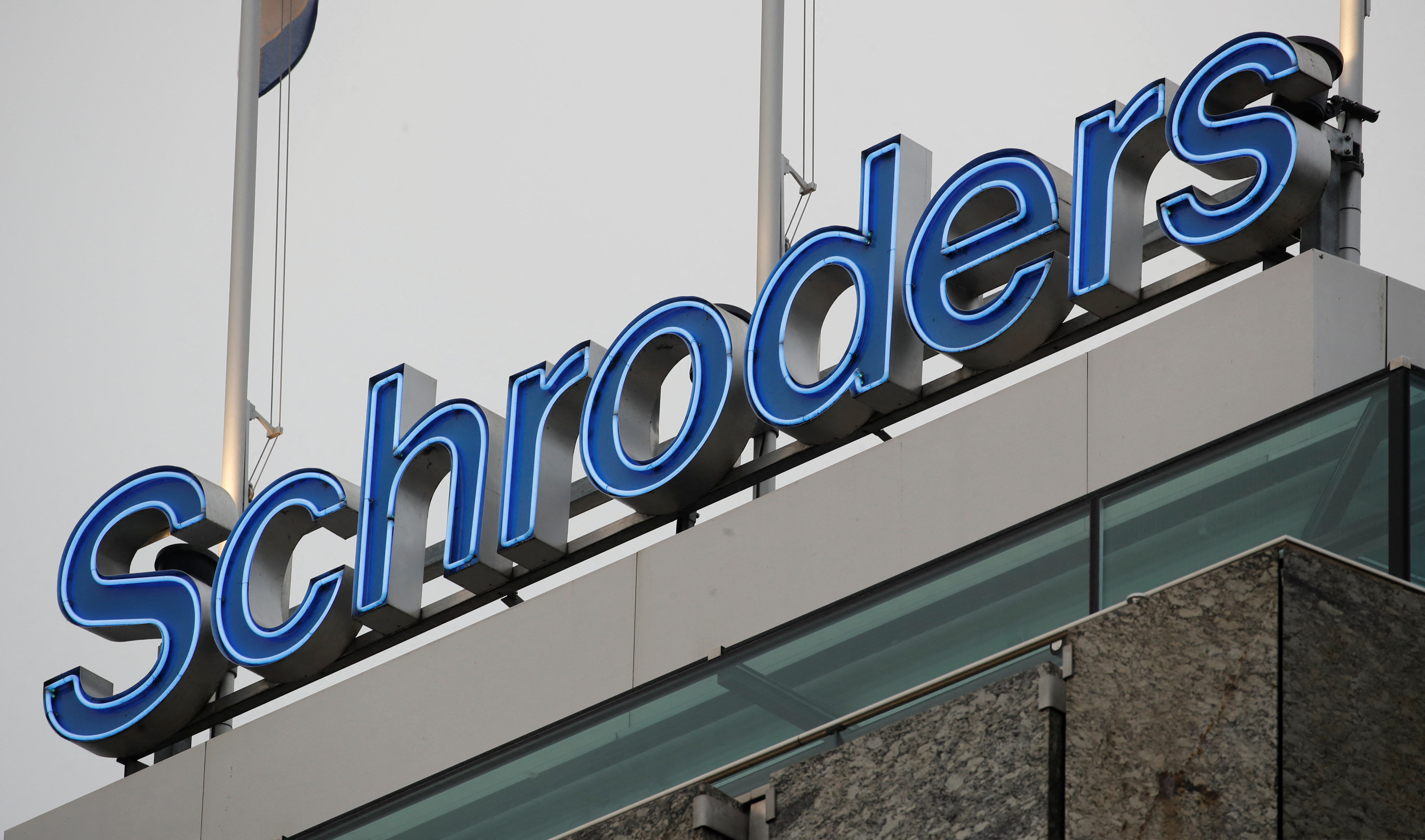 Logo of investment management company Schroders is seen in Zurich