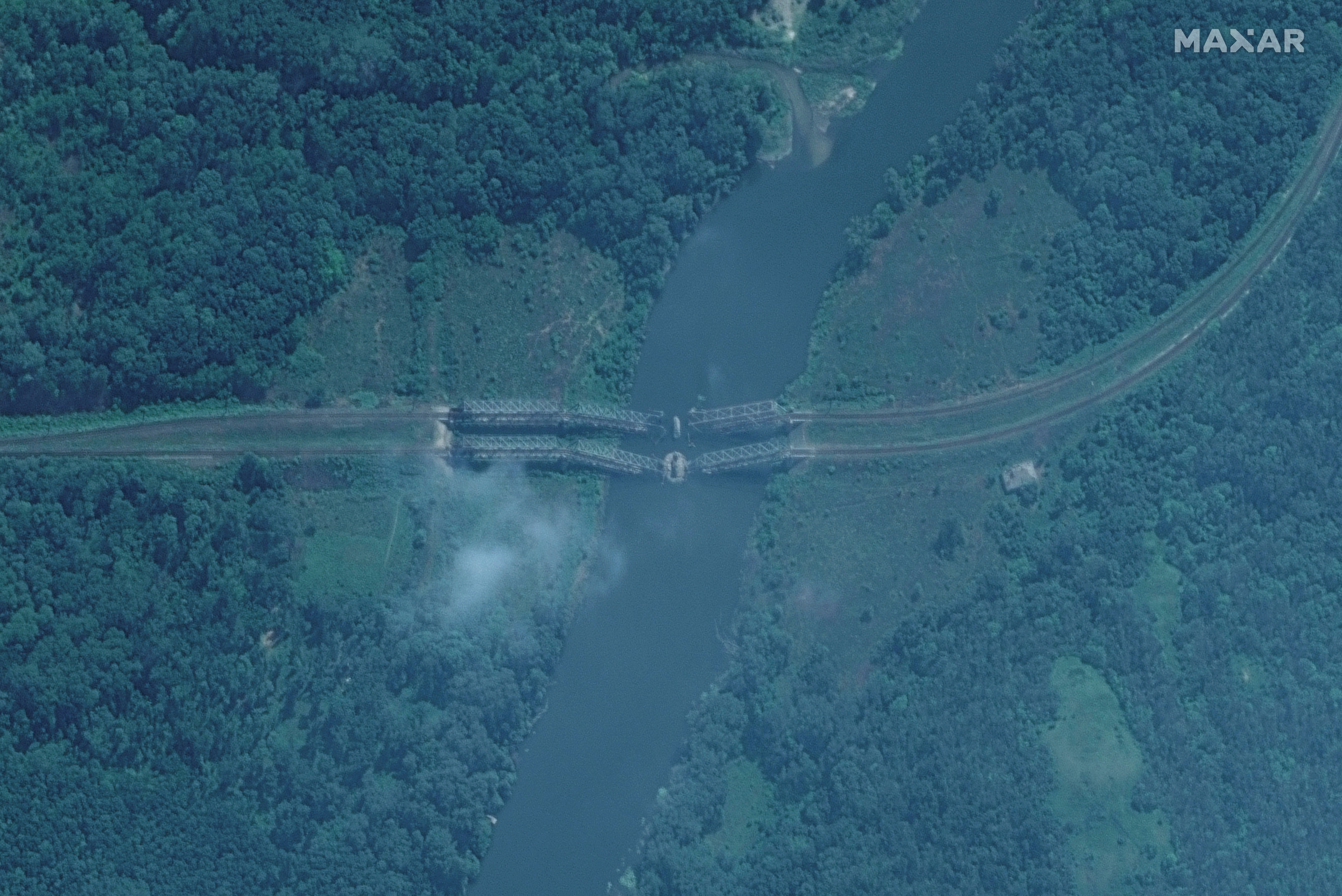 A satellite image shows damaged railroad bridges in the northwest of Severodonetsk