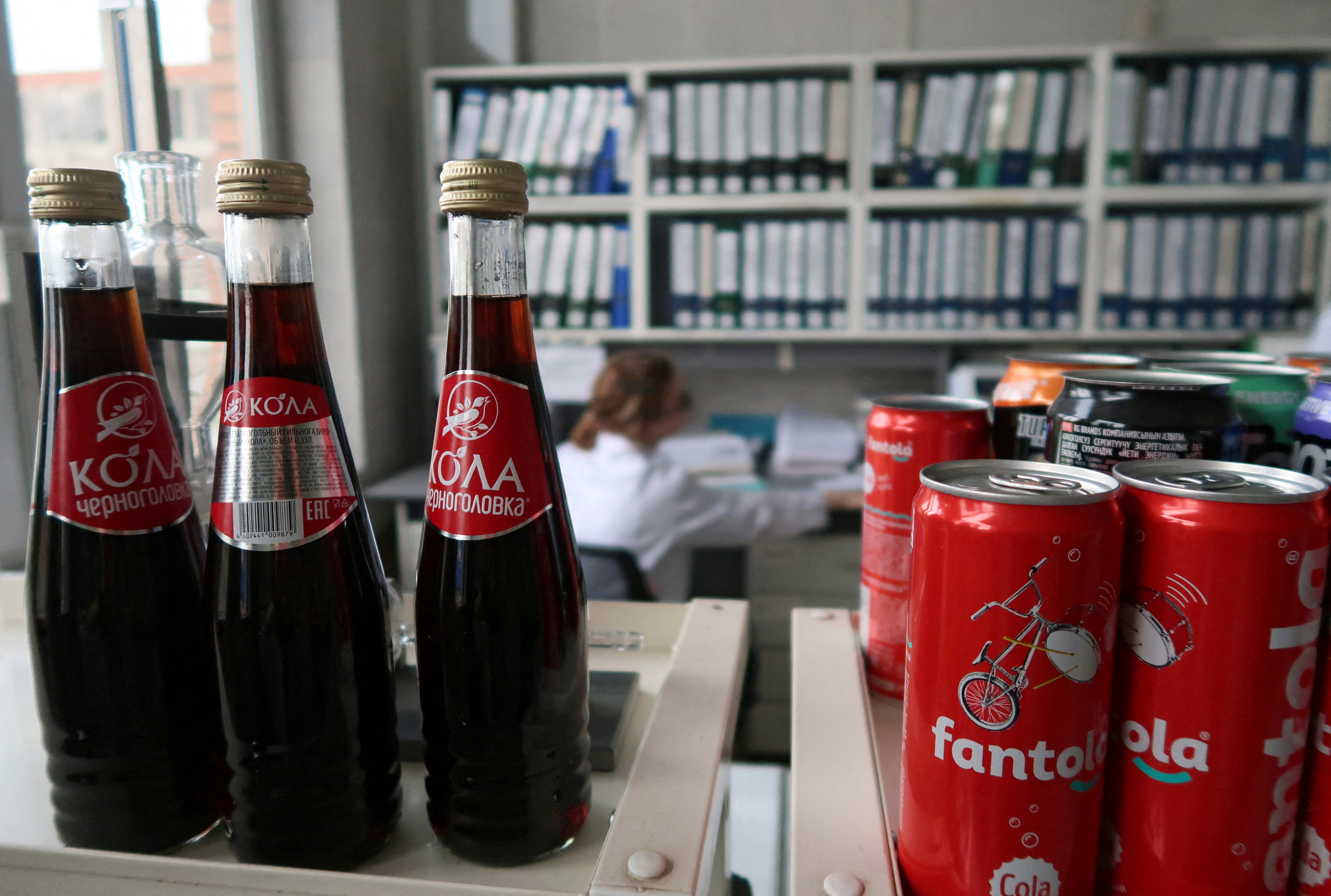 bottles and cans of soft drinks at a plant of the Chernogolovka company in Moscow Region