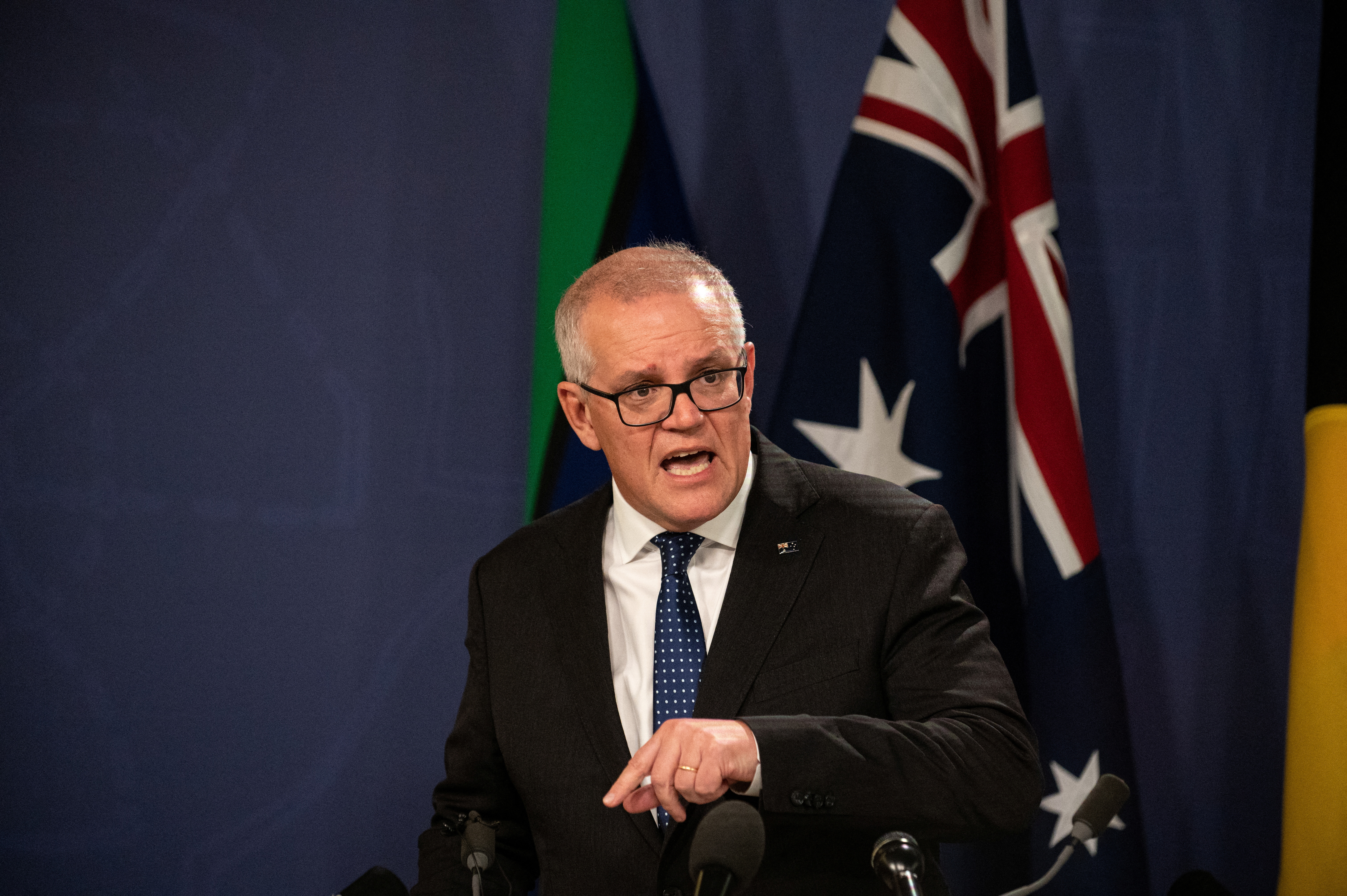 Former Australian Prime Minister Morrison speaks to media during a news conference in Sydney