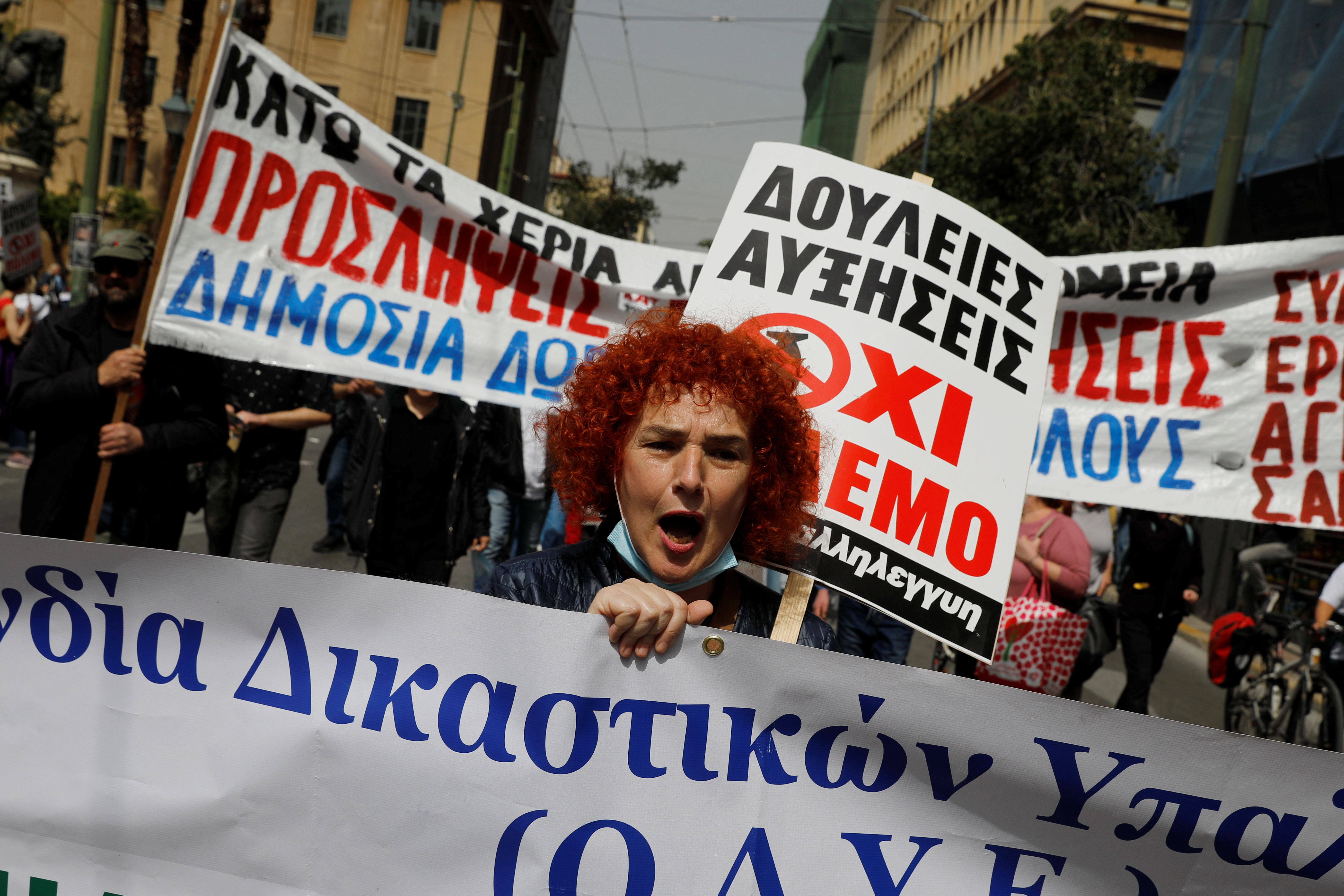 Eurozone crisis live: Thousands protest against Greek