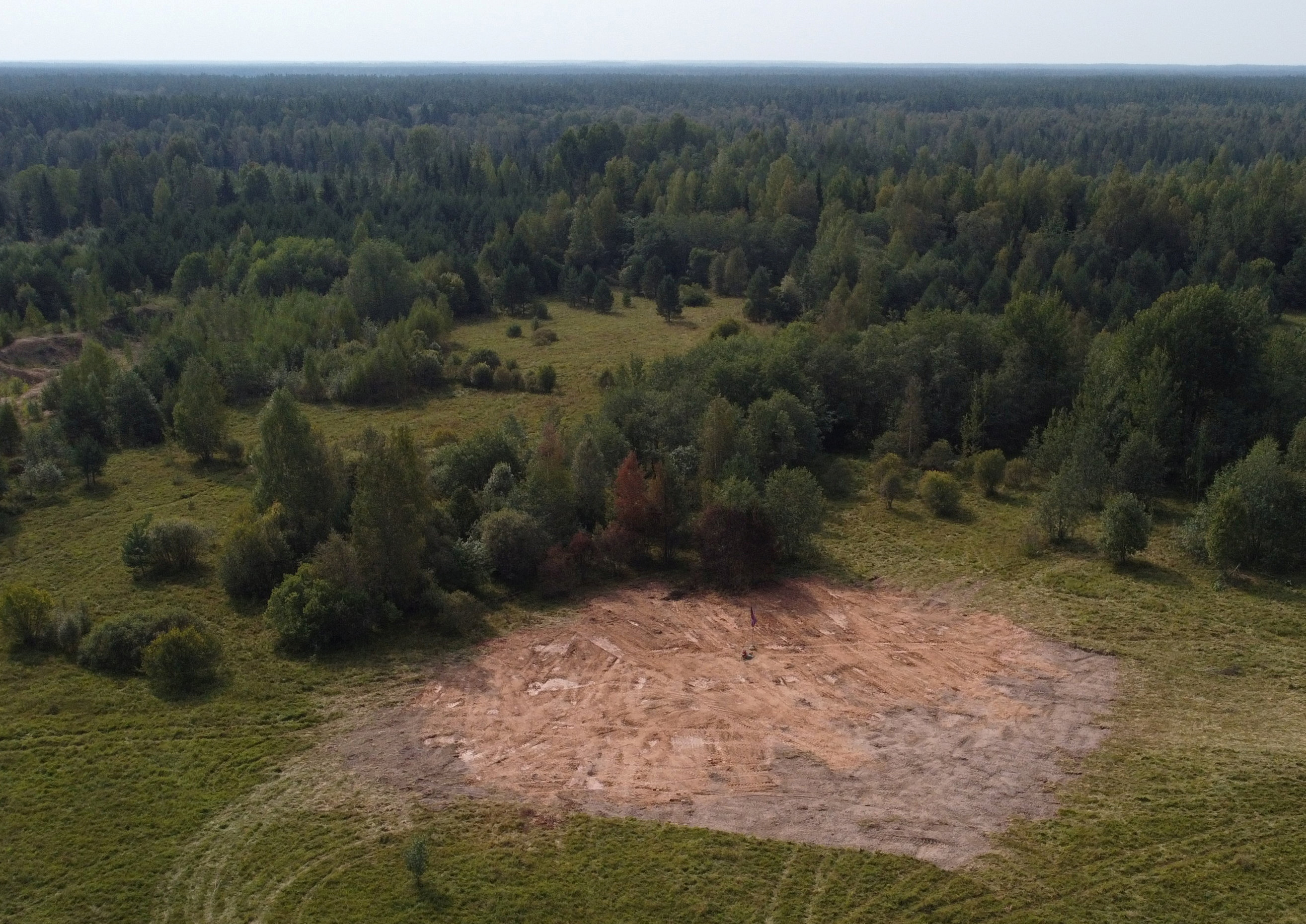 Wagner 'skull' flag flies over empty Prigozhin plane crash site in ...