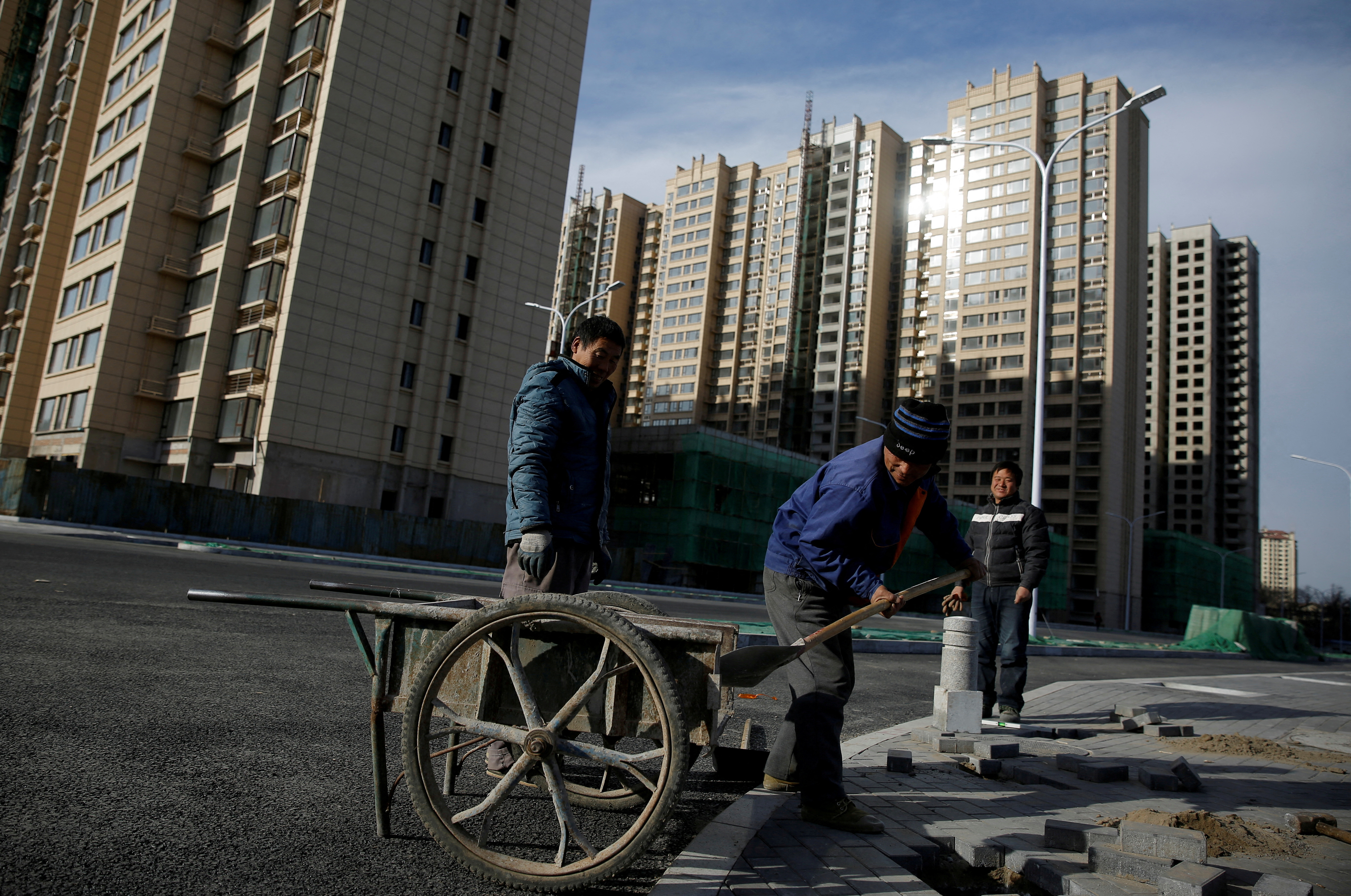 China approves guidelines to boost affordable housing amid property debt  crisis