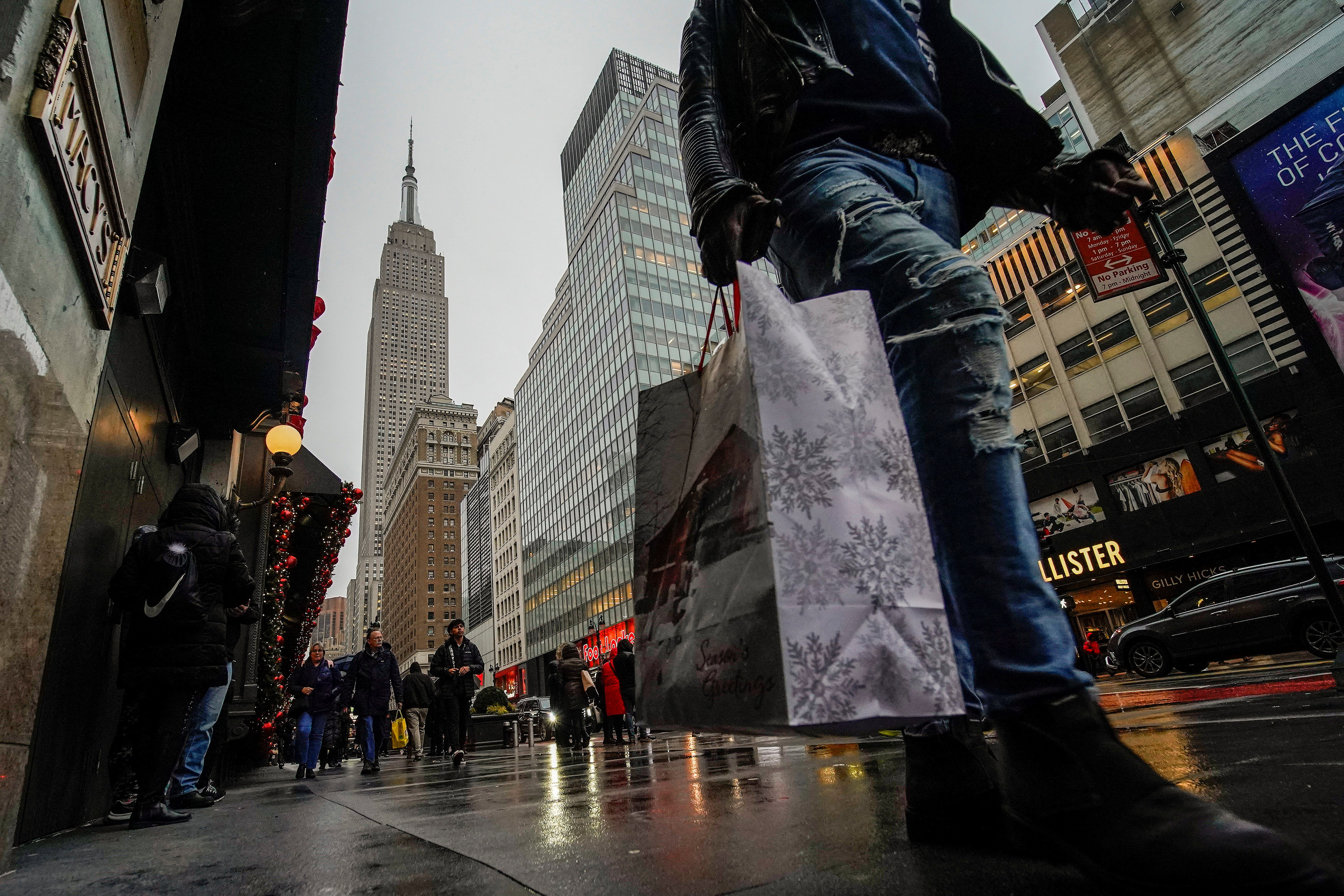 People carry shopping bags during the holiday season in New York