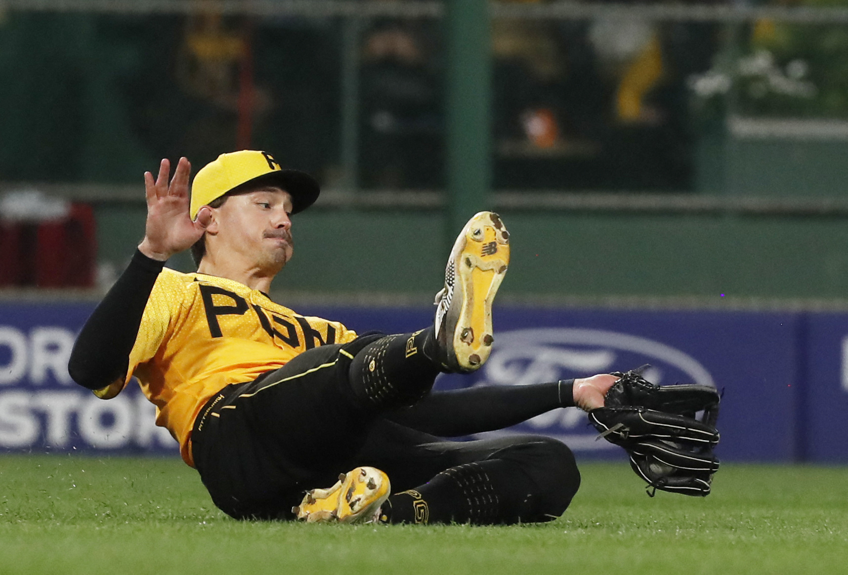 Pirates' VanMeter struggles as catcher, Reds-Bucs split DH –