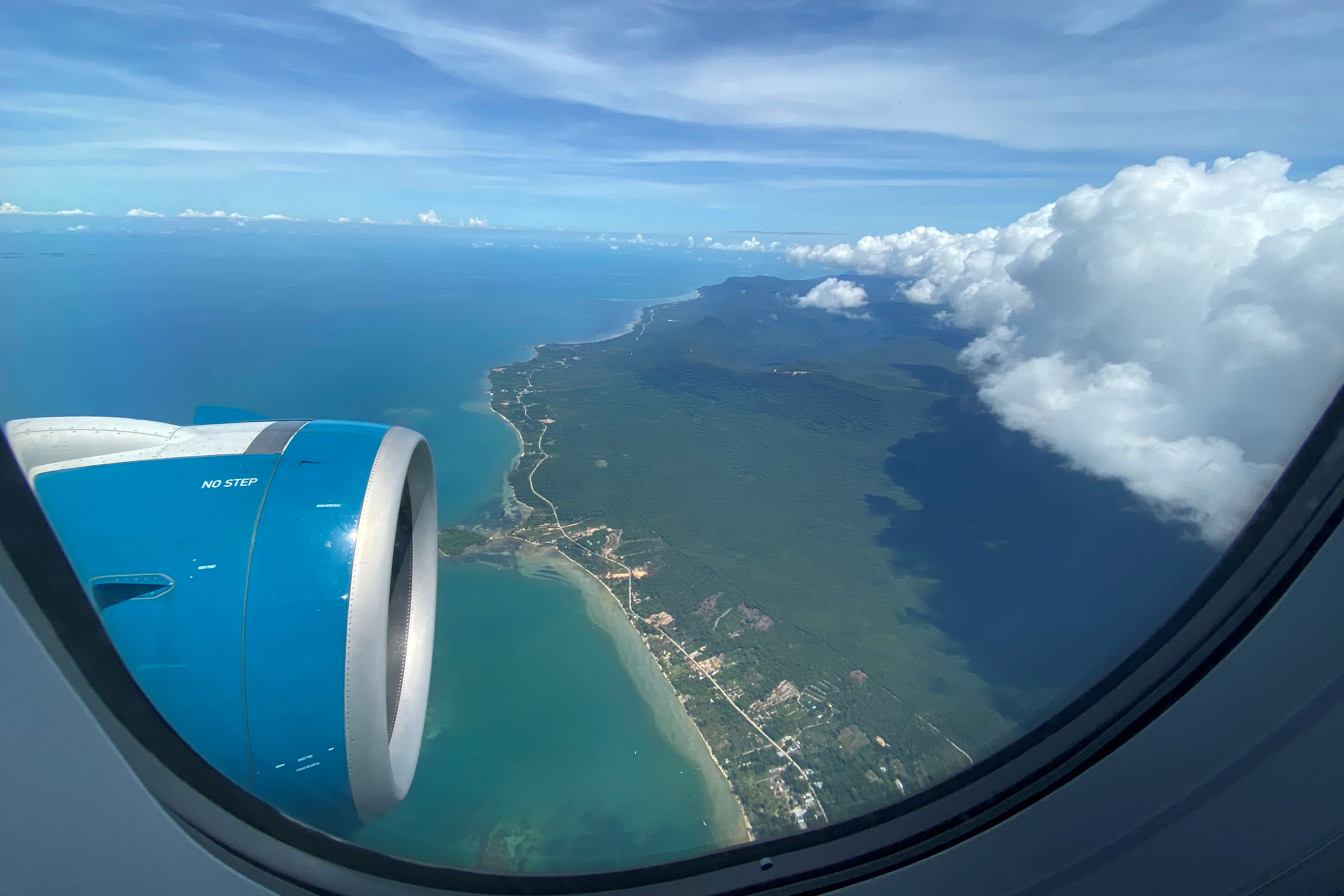 Phu Quoc resort island is seen via the window of an airplane after the Vietnamese government eased the lockdown following the coronavirus disease (COVID-19) outbreak, Phu Quoc Island