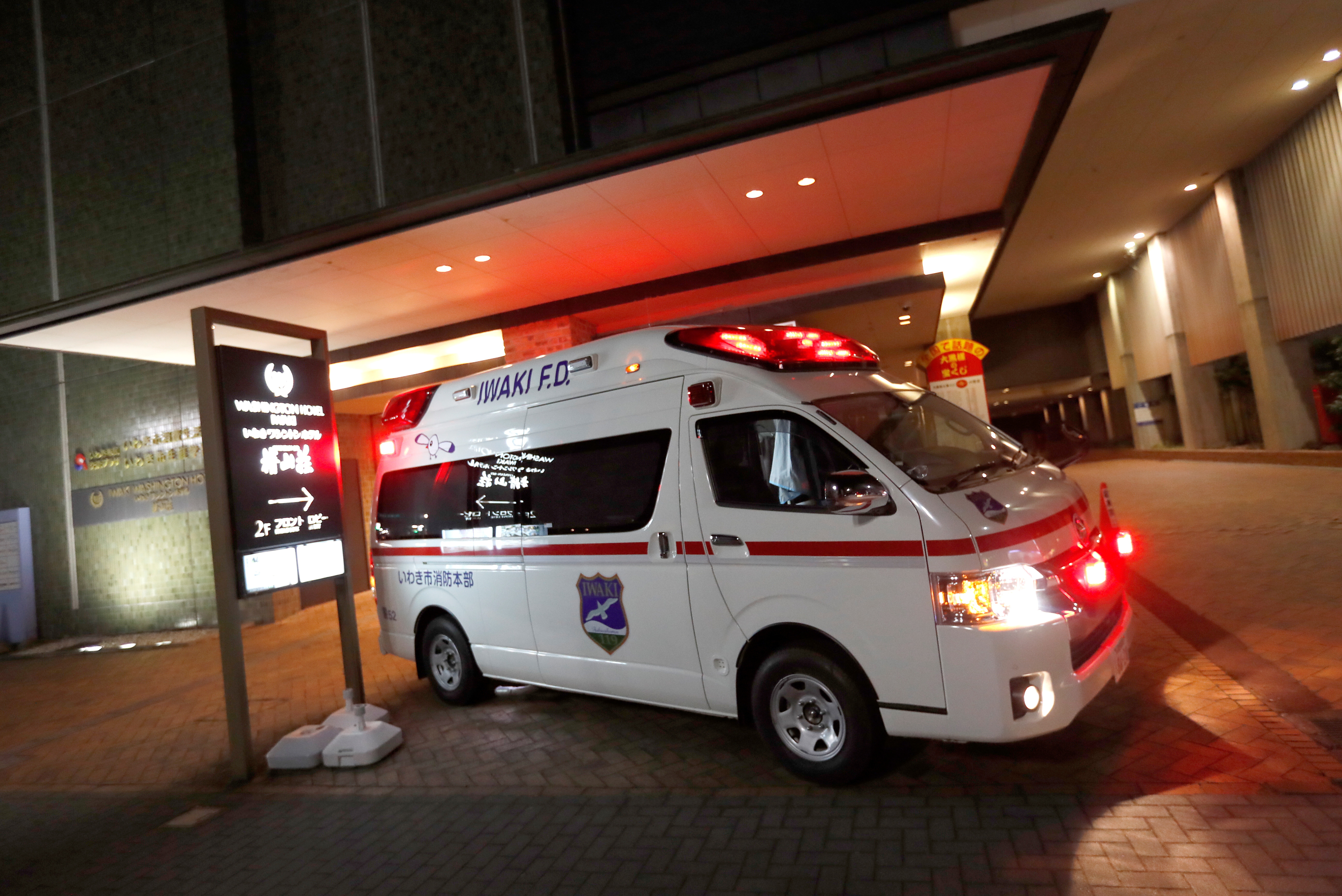 An ambulance is seen in front of a hotel following a strong earthquake in Iwaki, Fukushima prefecture, Japan February 13, 2021.  REUTERS/Issei Kato