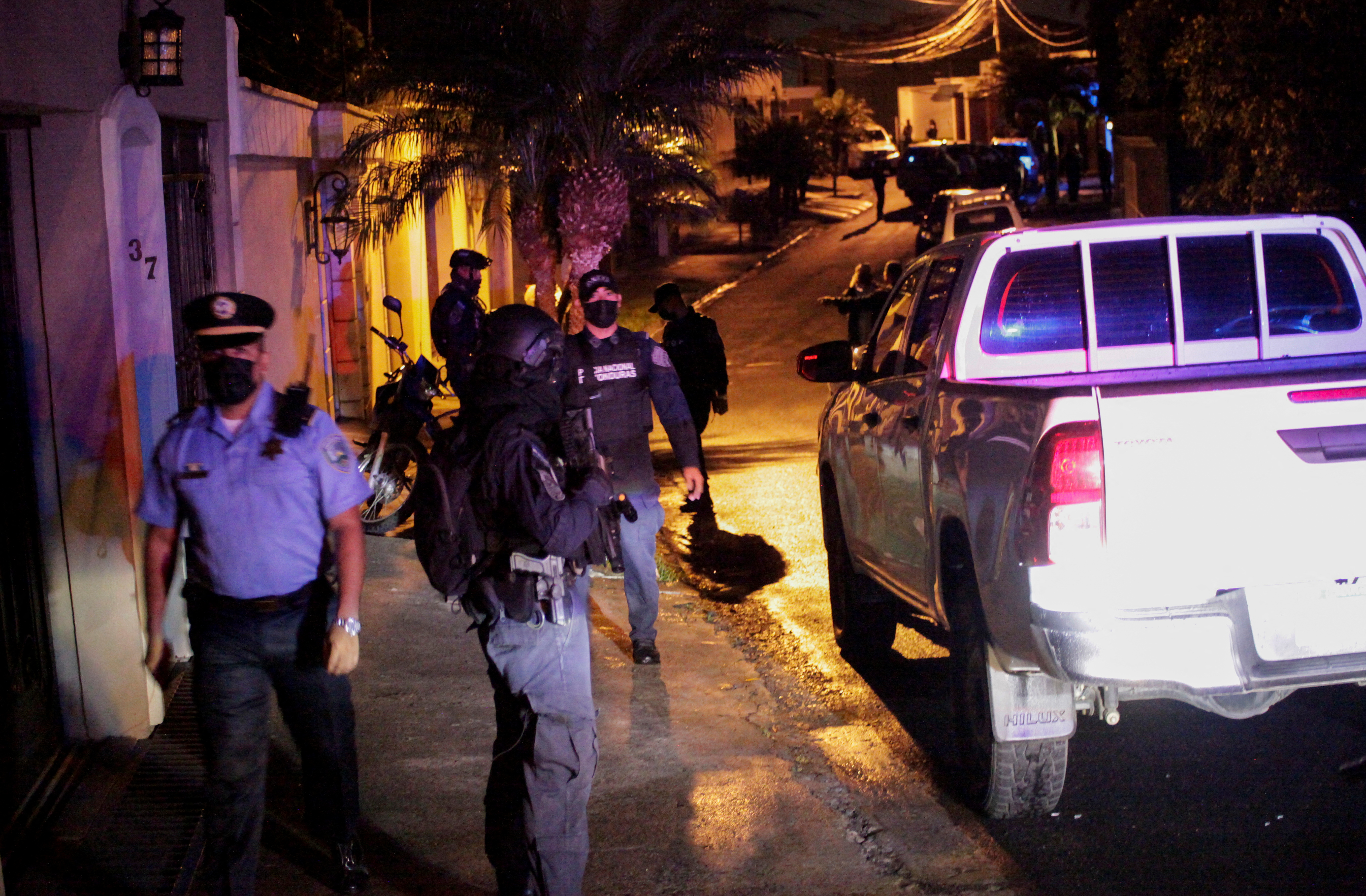 Police surround house of ex-Honduran president after U.S. seeks extradition, in Tegucigalpa
