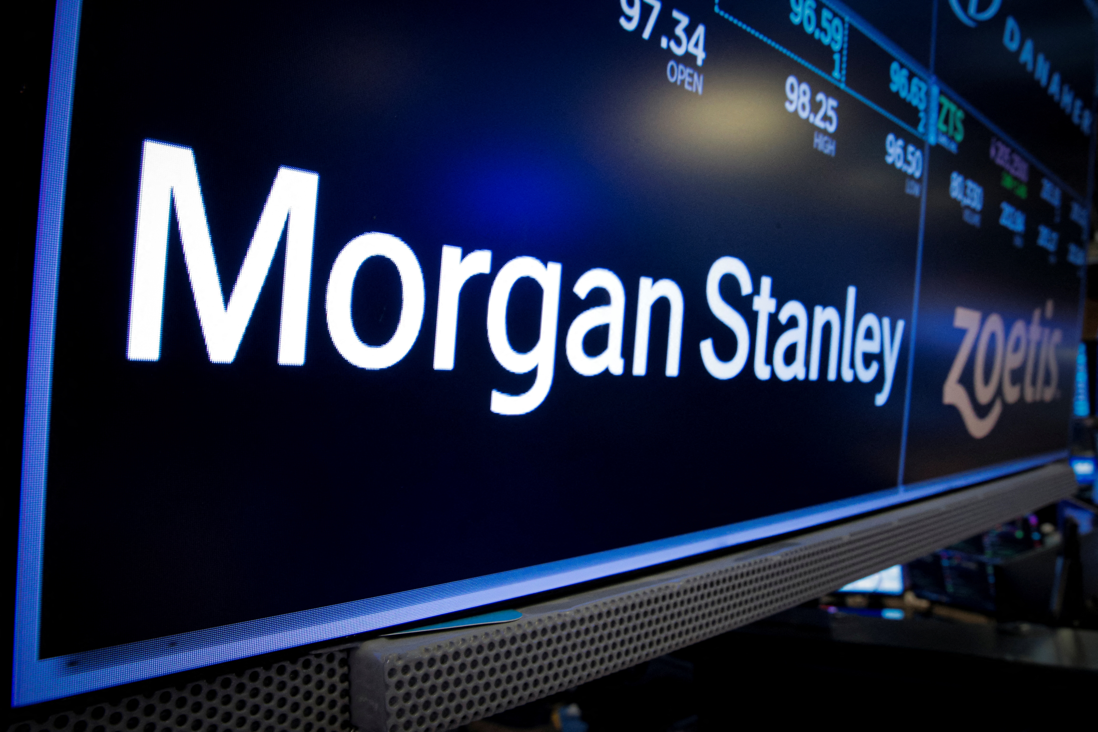 A screen displays the trading information for Morgan Stanley on the floor of the NYSE in New York