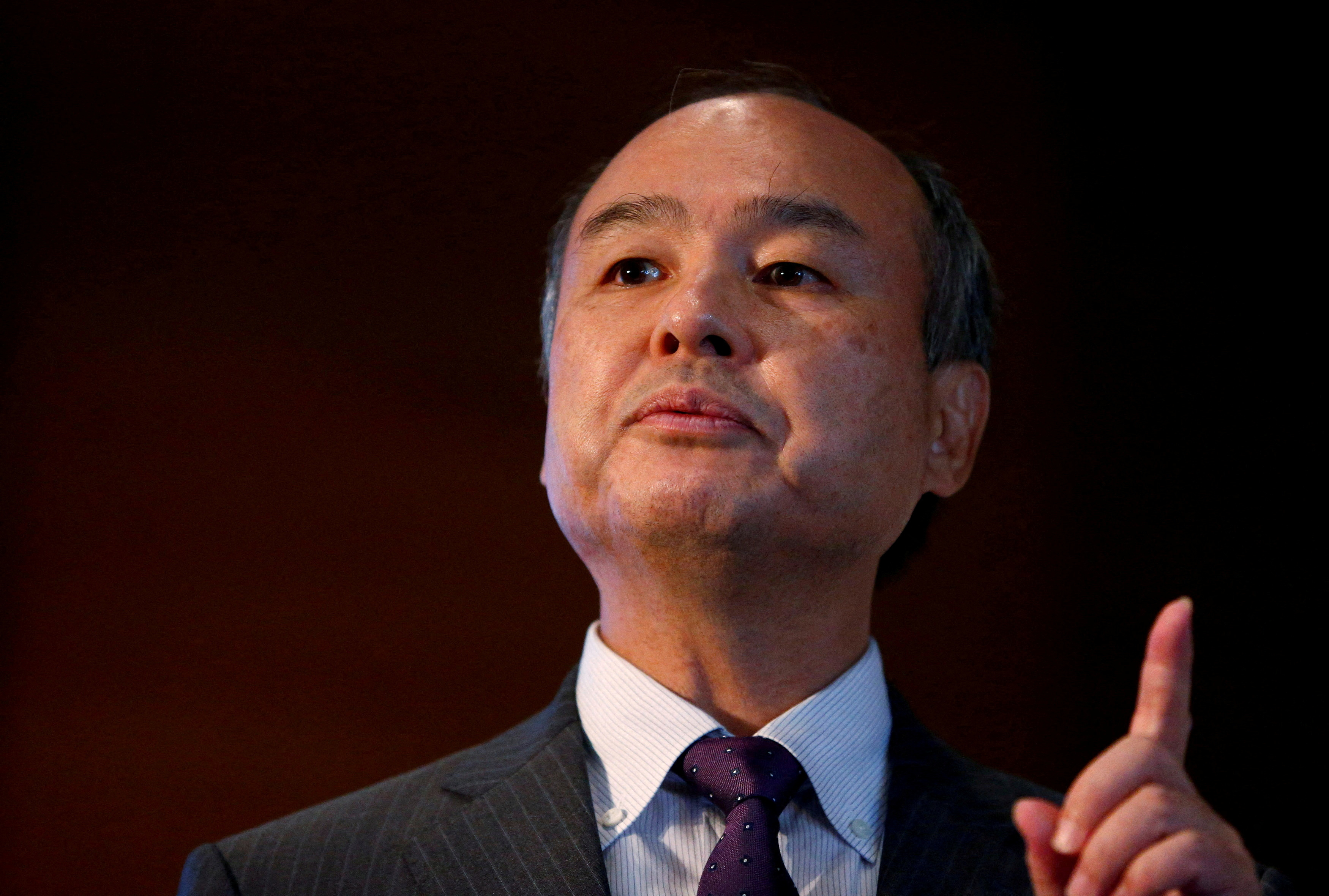 SoftBank Group CEO Masayoshi Son speaks at a news conference in London