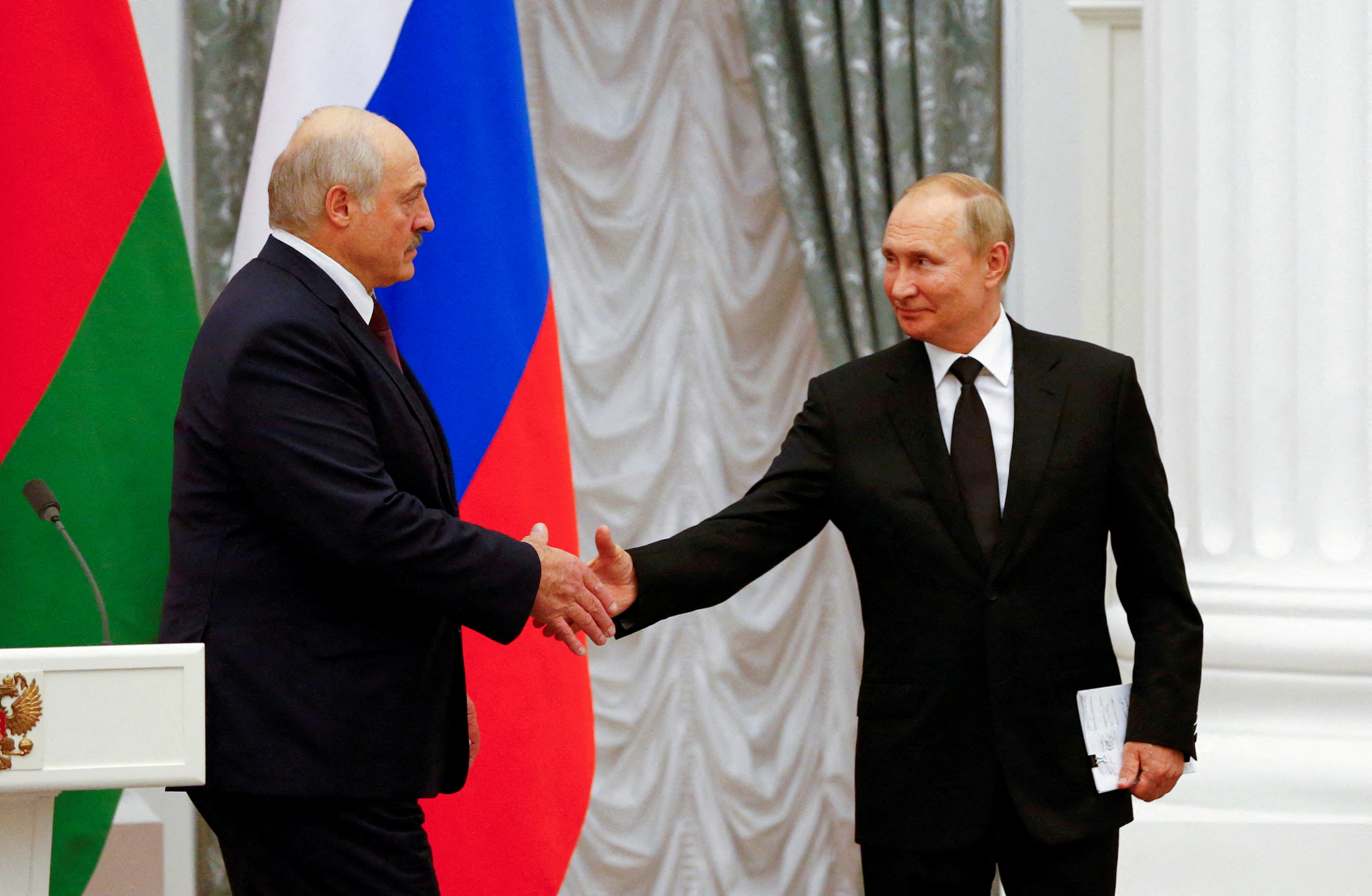 Russian President Putin and Belarusian leader Lukashenko attend a news conference in Moscow