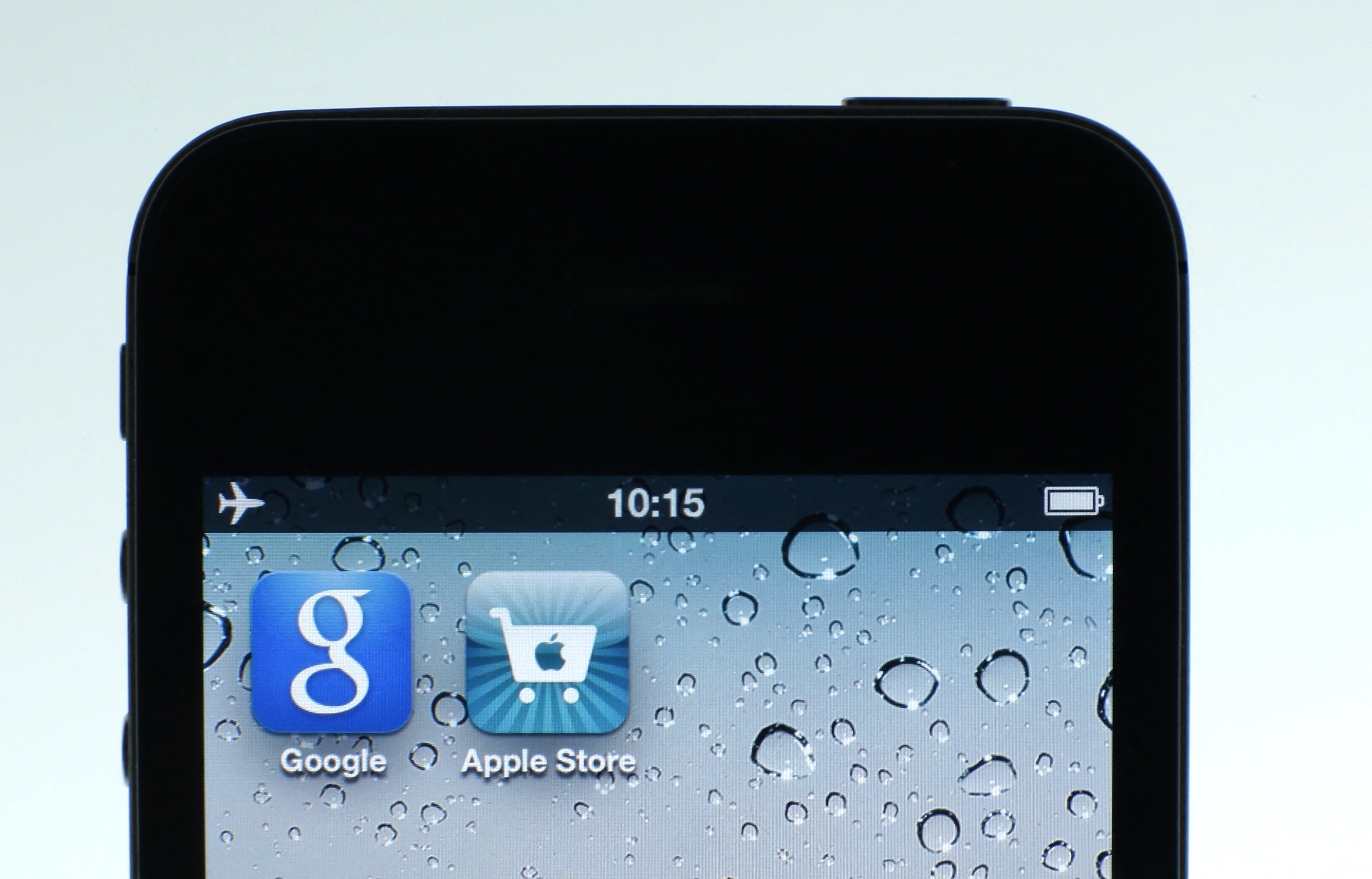 Google and Apple applications are seen on the display of IPhone in this photo illustration taken in Berlin