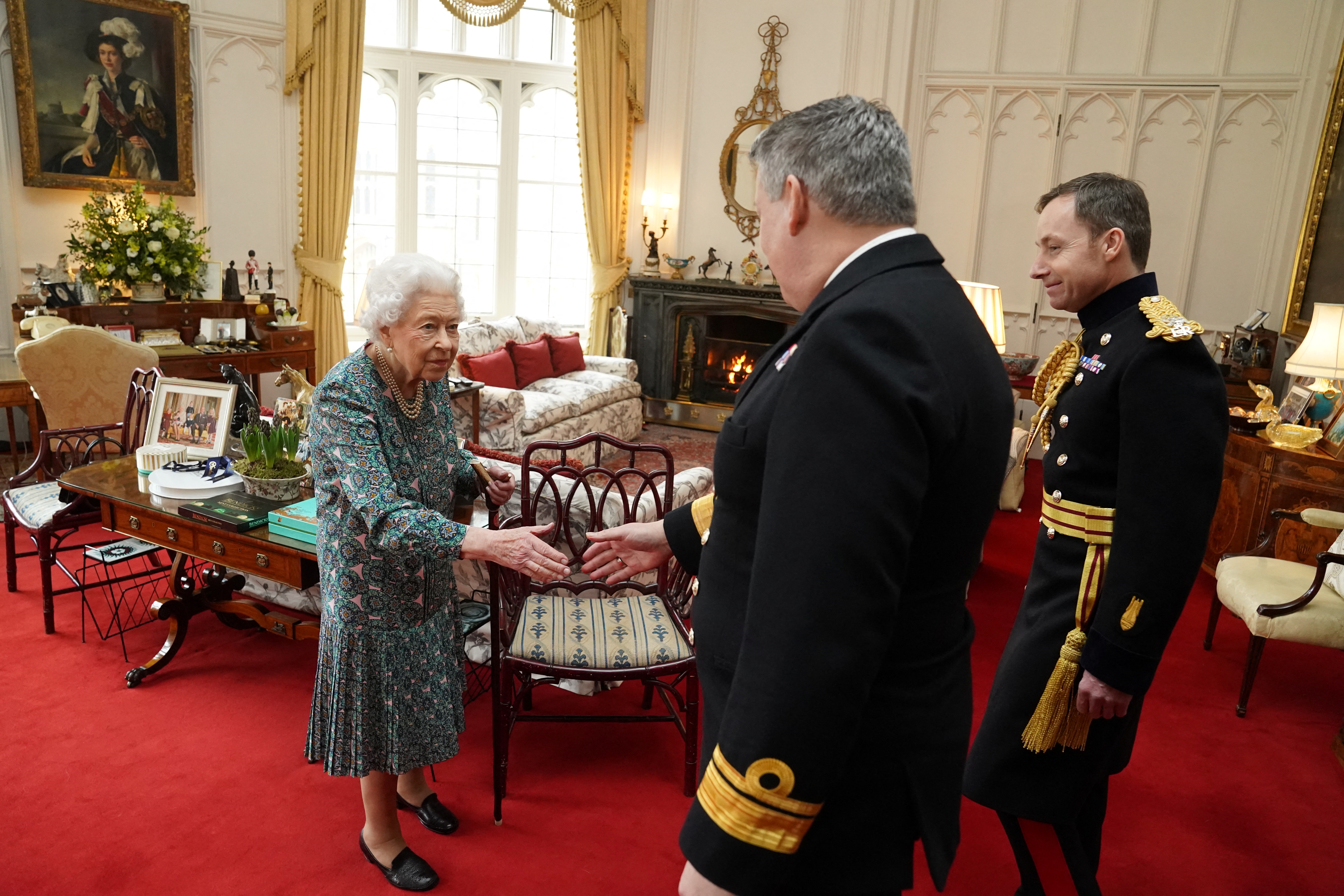 Britain's Queen Elizabeth meets the incoming and outgoing Defence Service Secretaries at Windsor Castle