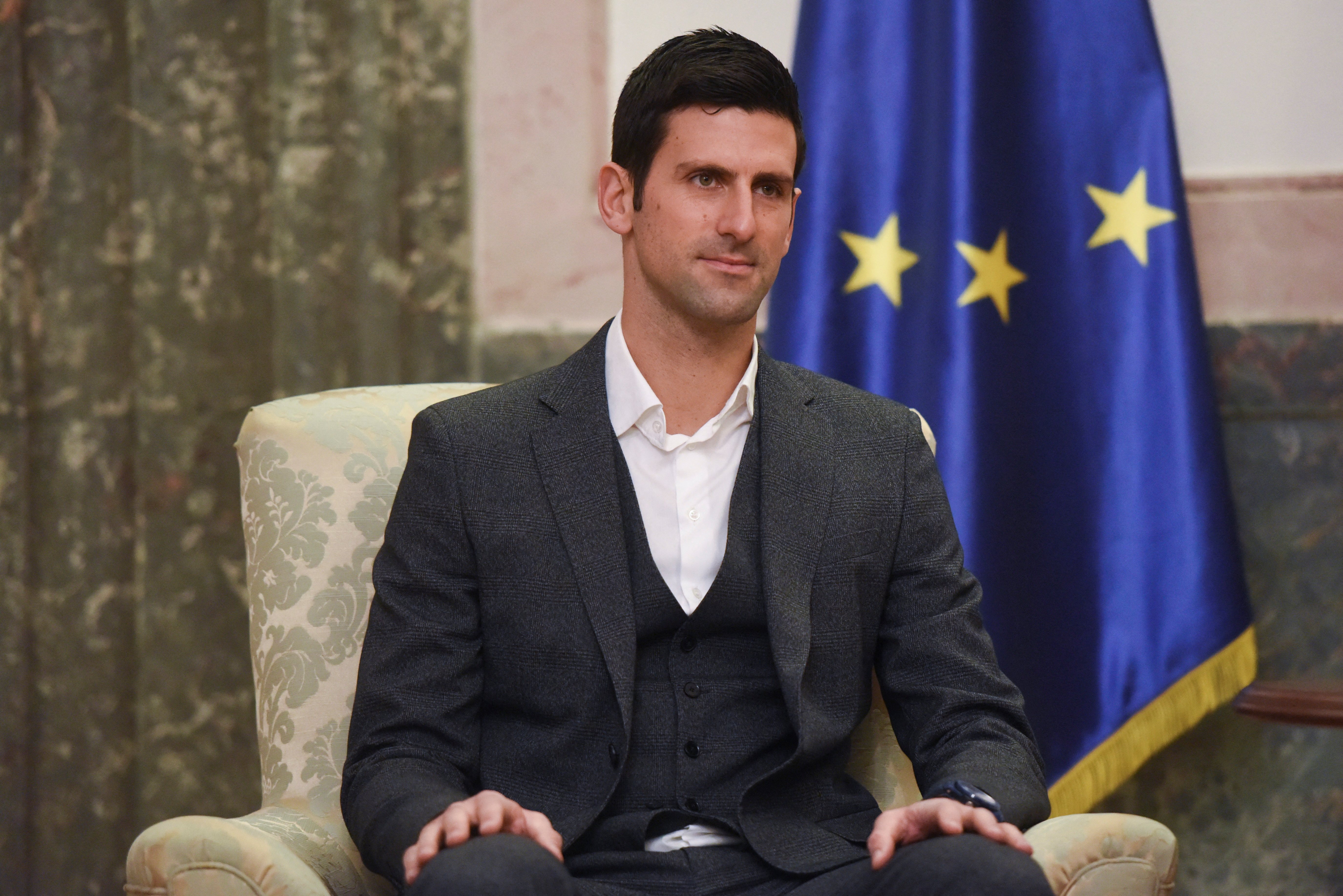 Serbian tennis player Novak Djokovic speaks with Serbia's President in Belgrade