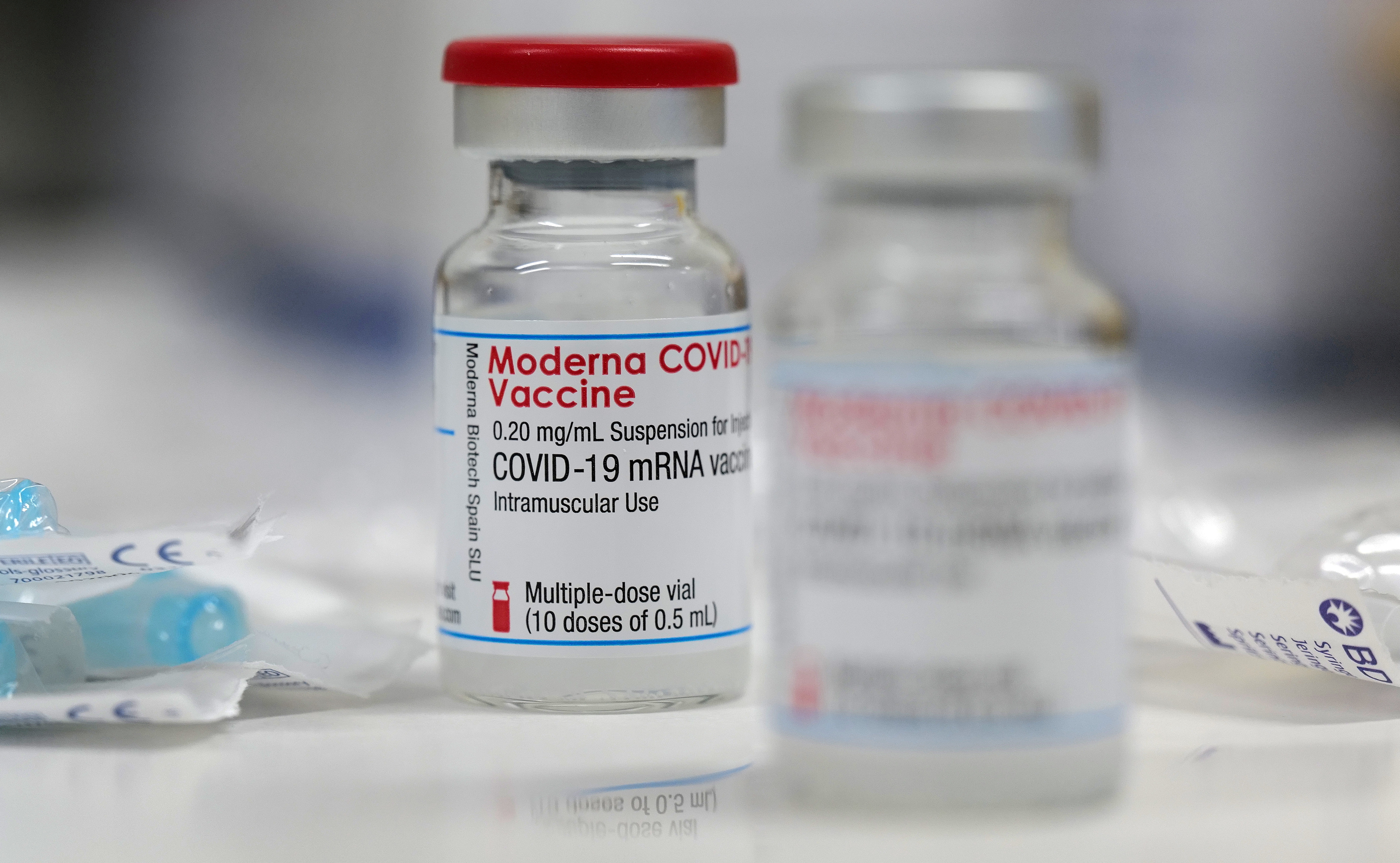 A vial of the Moderna COVID-19 vaccine is seen at a clinic in Aschaffenburg