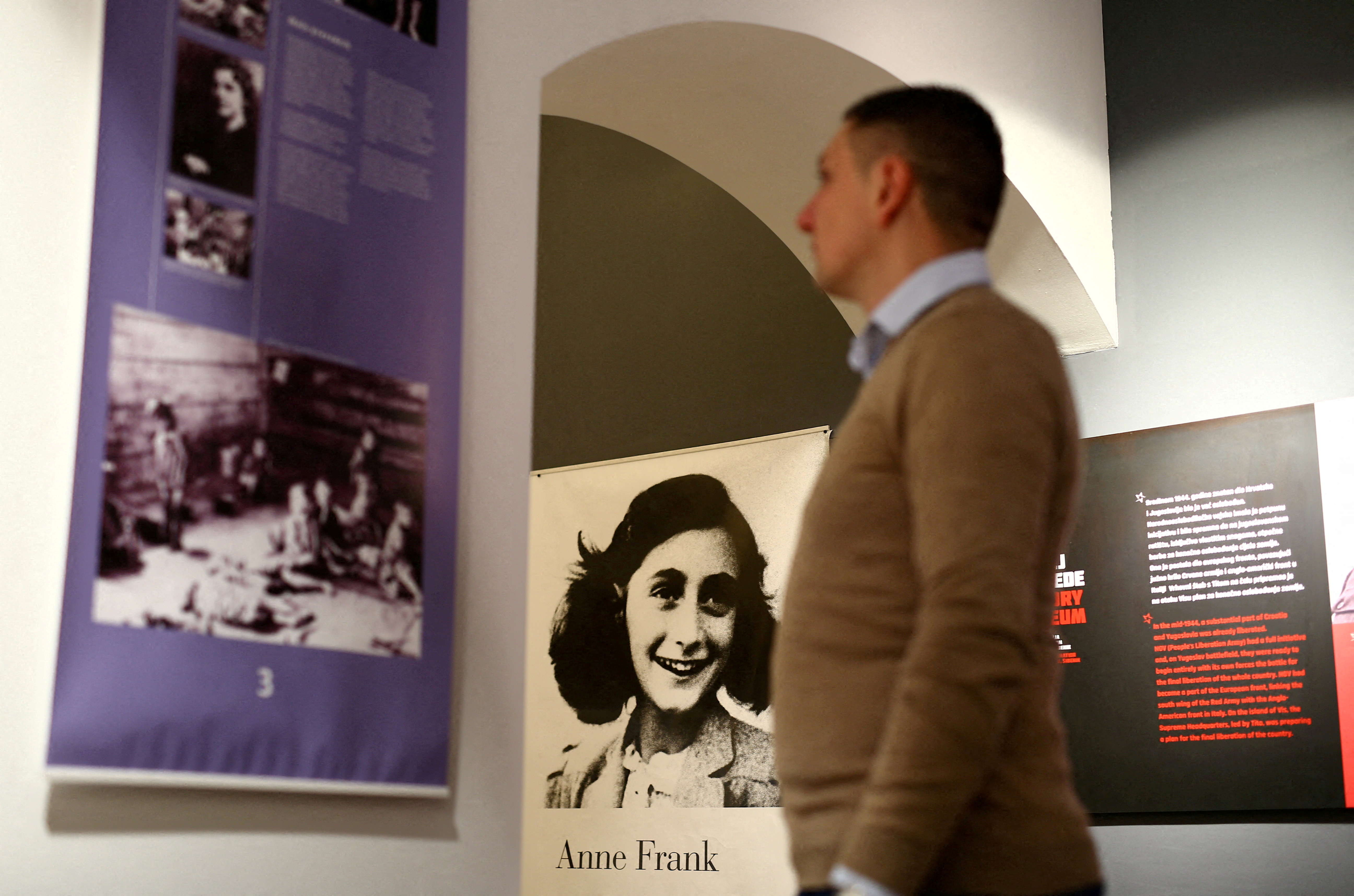 A man looks at an exhibition about Anne Frank at the Victory museum in Sibenik