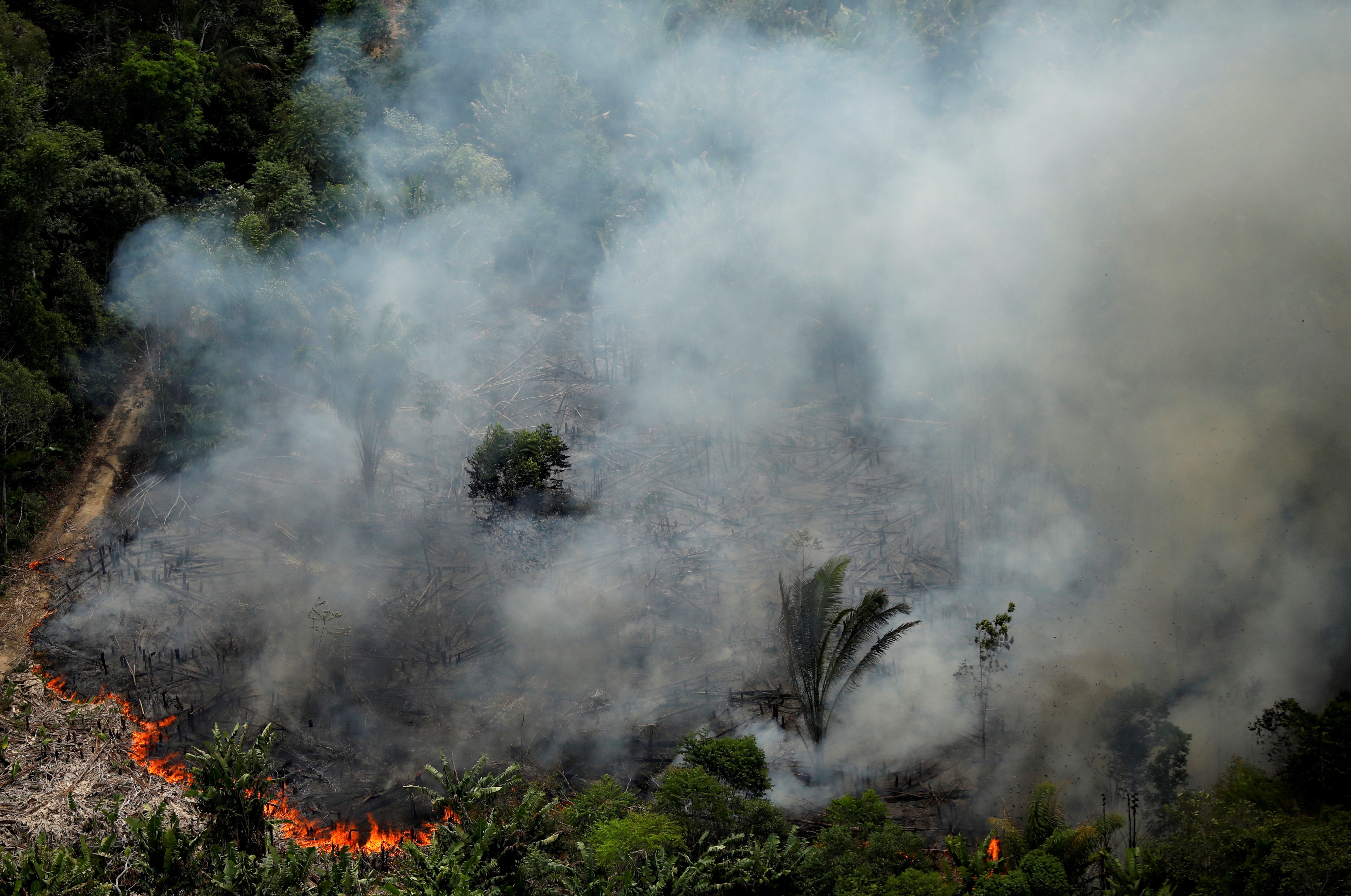 An aerial view shows a fire in an area of the Amazon rainforest near Porto Velho