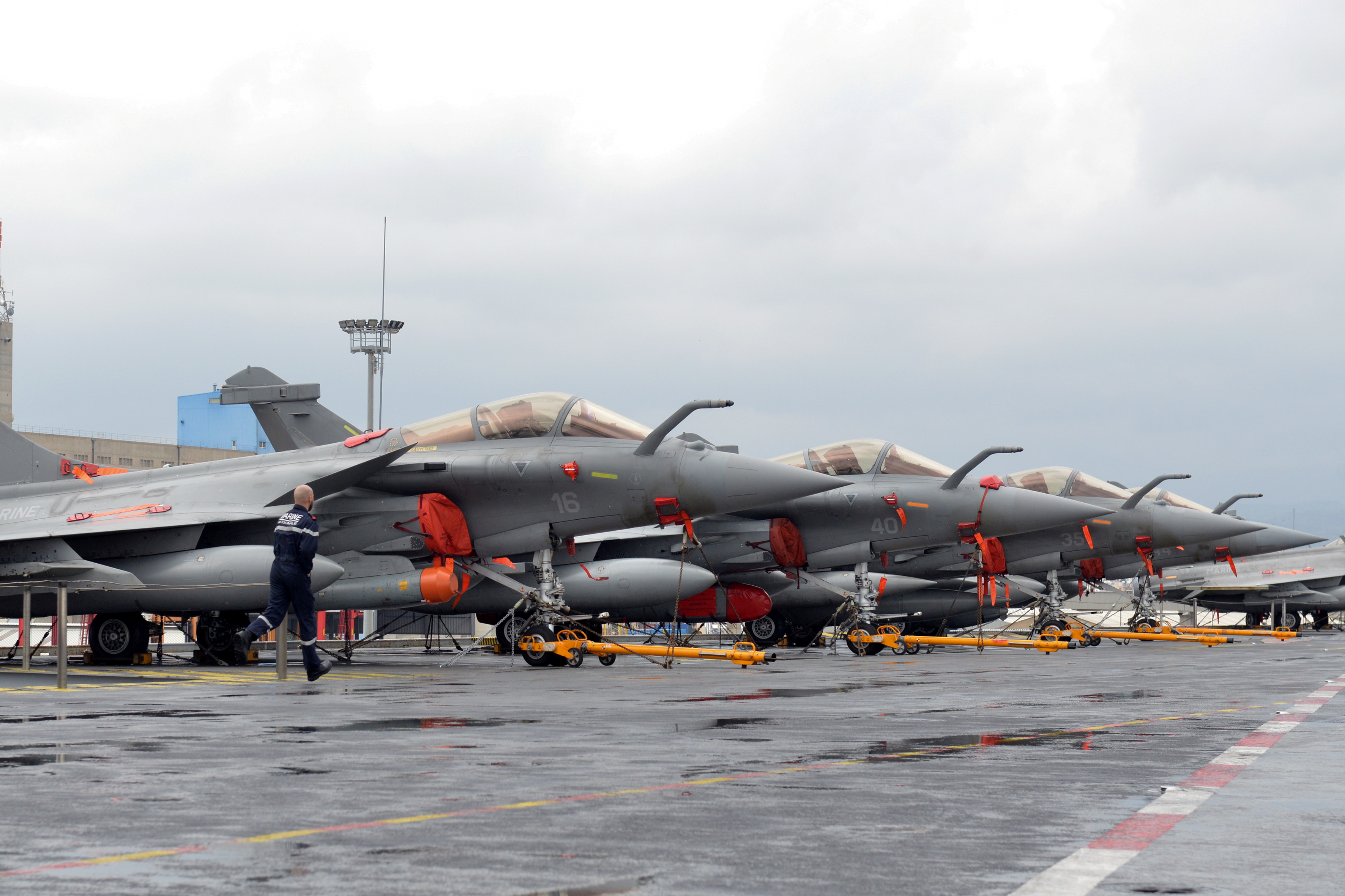 French Navy Rafale fighter jets are seen onboard the Charles de Gaulle aircraft carrier, currently moored at the port of Limassol