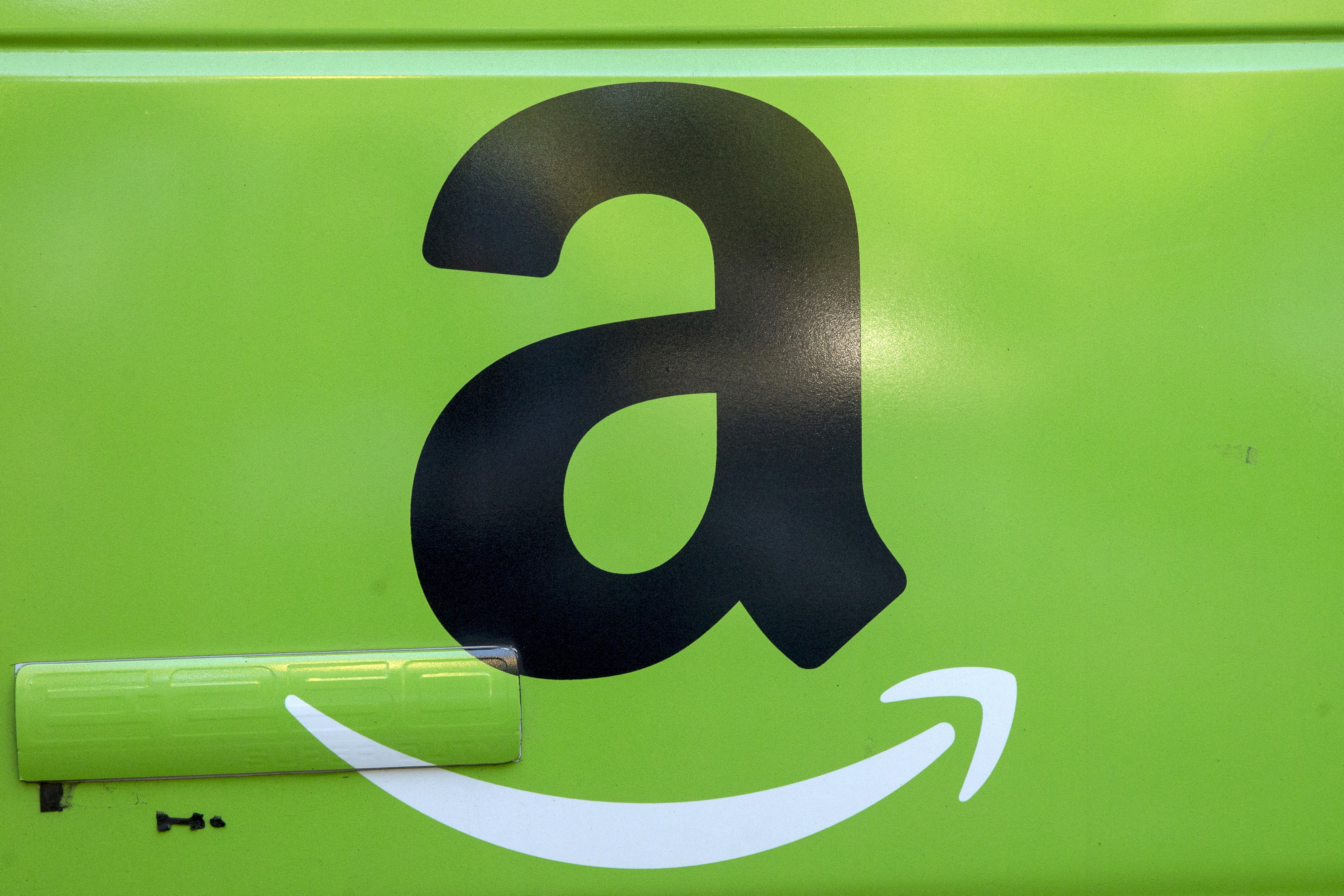 The Amazon.com Inc. logo is seen on the side of a delivery truck in Brooklyn