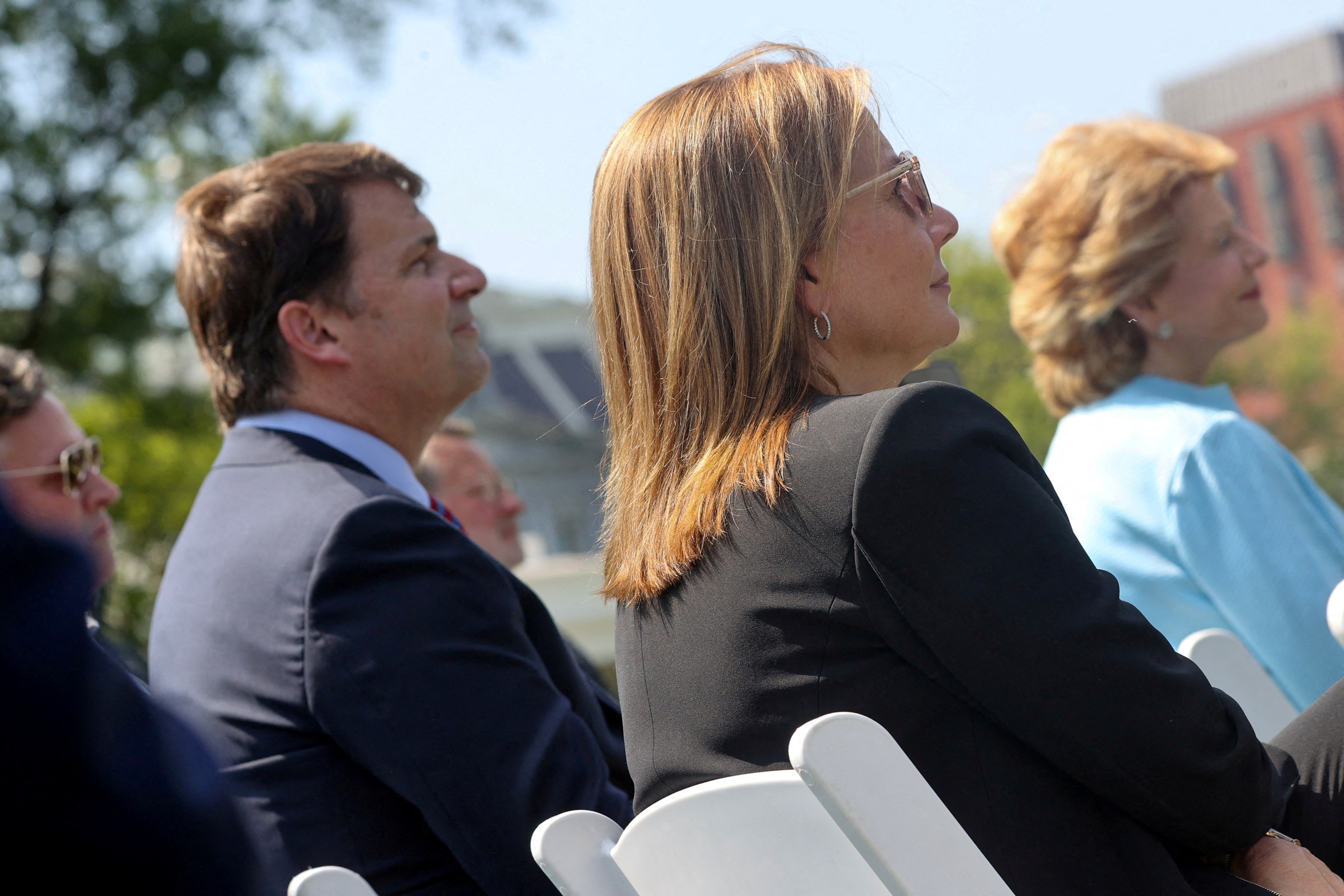 The CEOs of Ford and GM, Farley and Barra, are pictured at an event in Washington