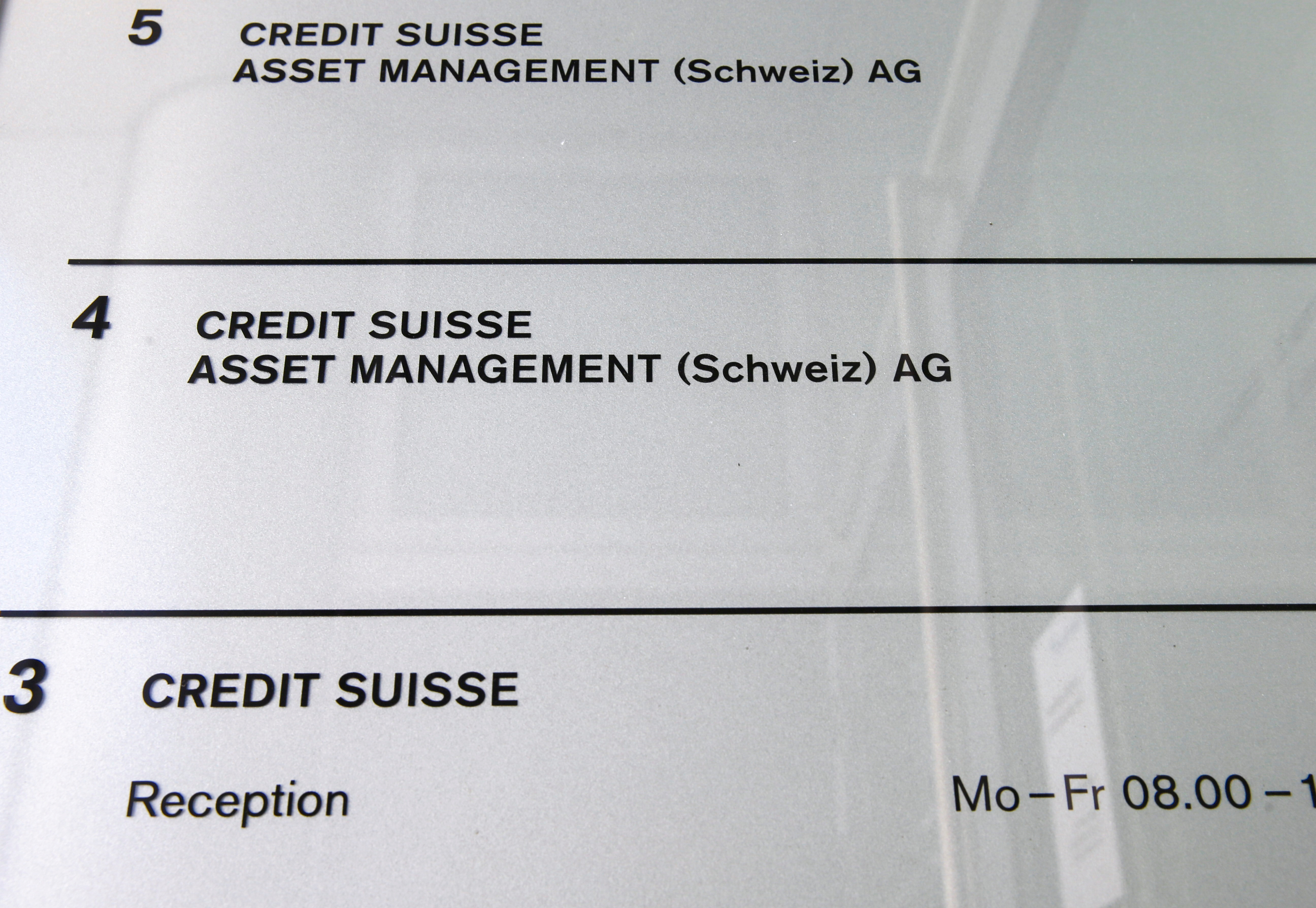 Credit Suisse Asset Management is named at the entrance of an office building in Zurich