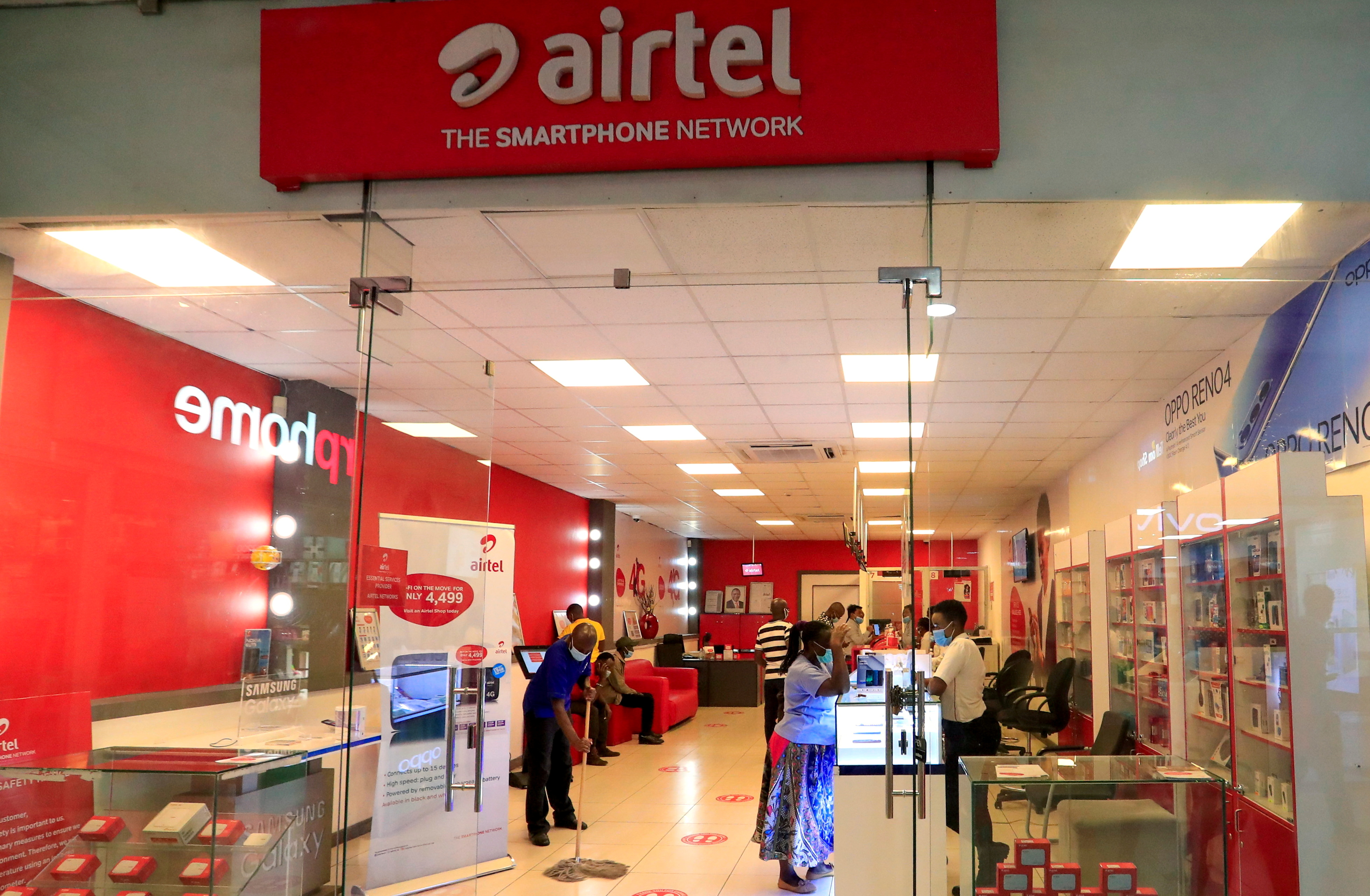 A general view shows customers and employees inside a mobile phone service centre operated by Kenyan telecom operator Airtel Kenya at the Sarit Centre within the Westlands district of Nairobi