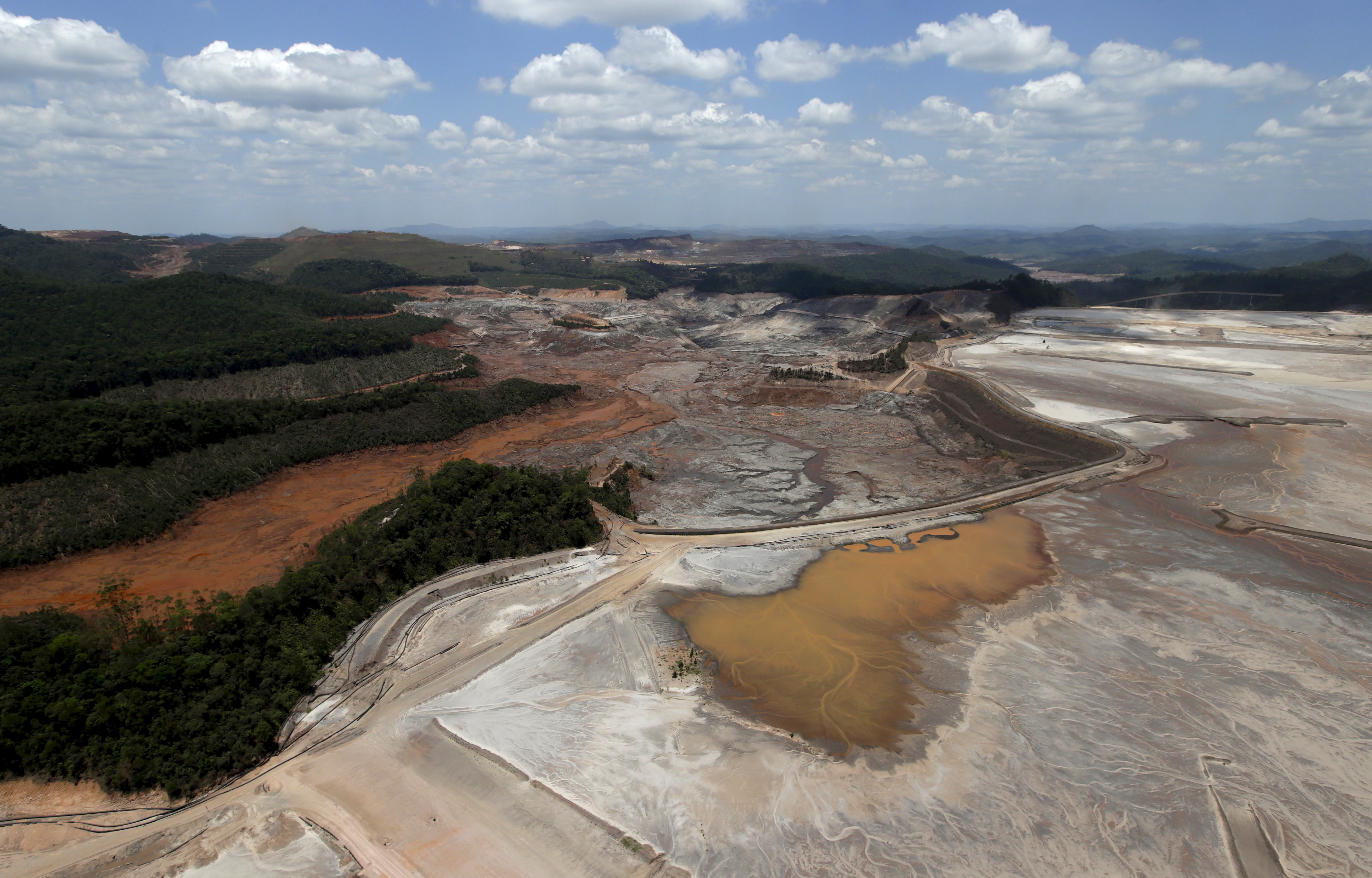 General view from above of a dam owned by Vale SA and BHP Billiton Ltd that burst, in Mariana
