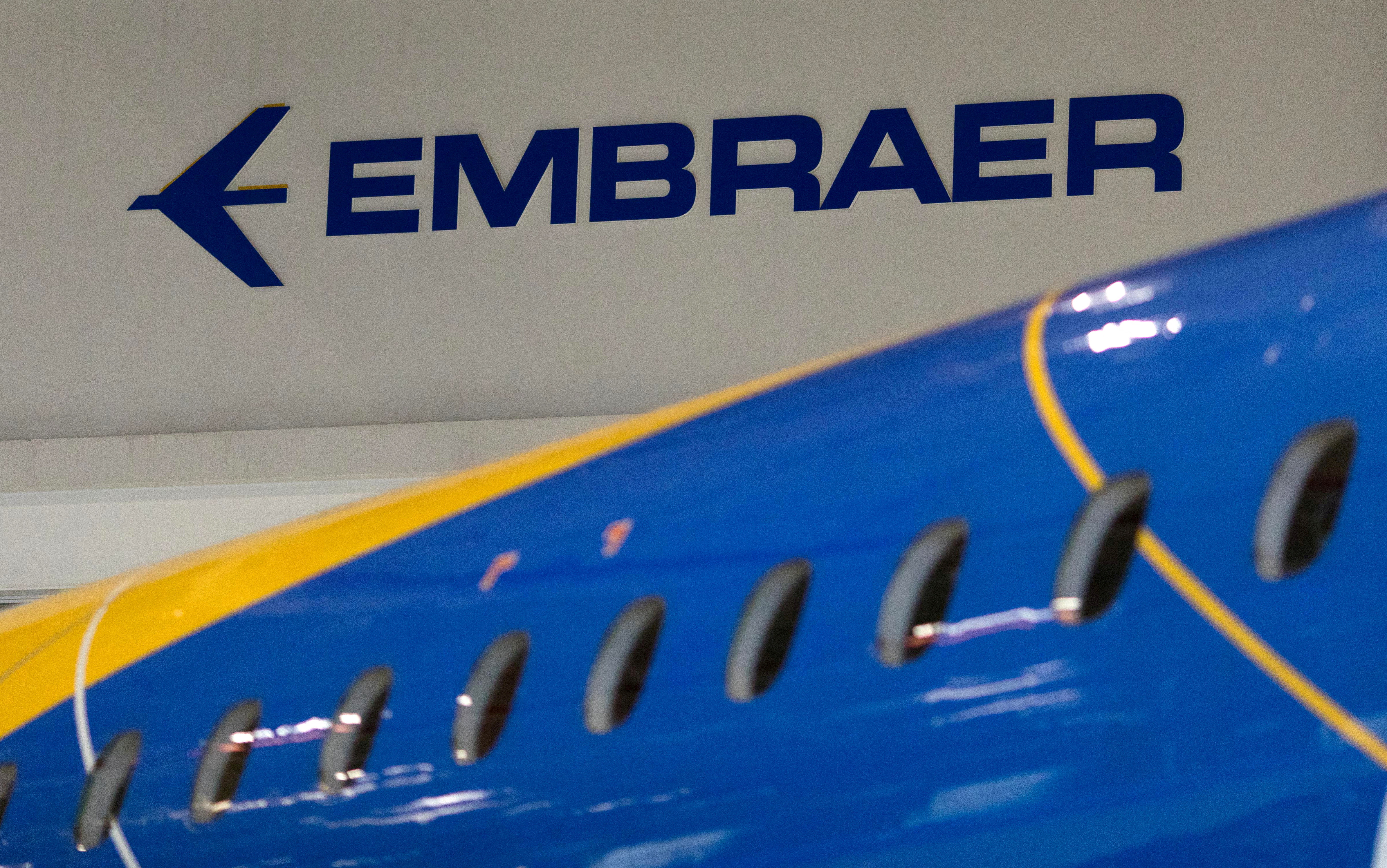 The logo of Brazilian planemaker Embraer SA is seen at the company's headquarters in Sao Jose dos Campos
