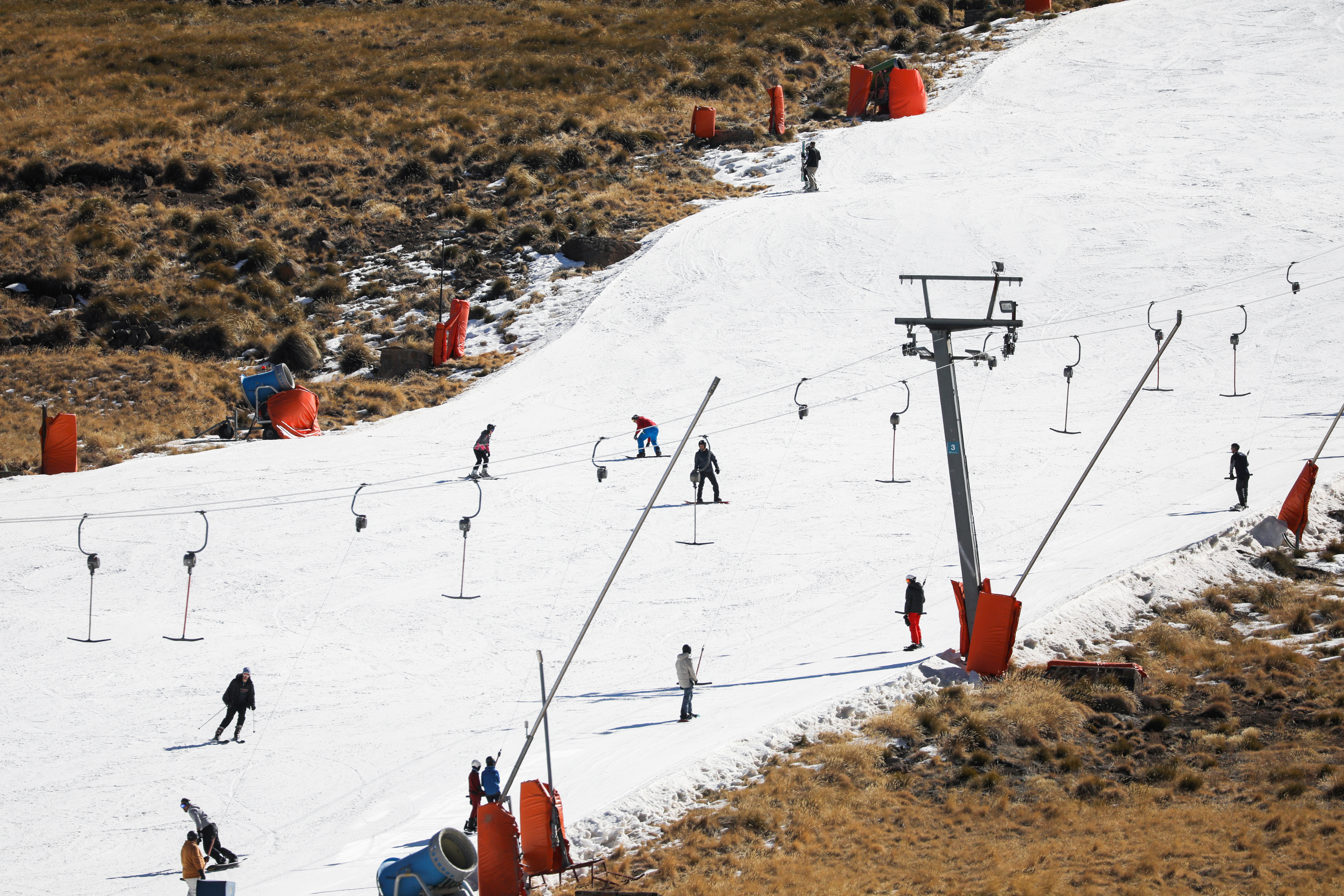 People ski at Kapoko Snow Park at Afriski Mountain Resort in Butha Buthe