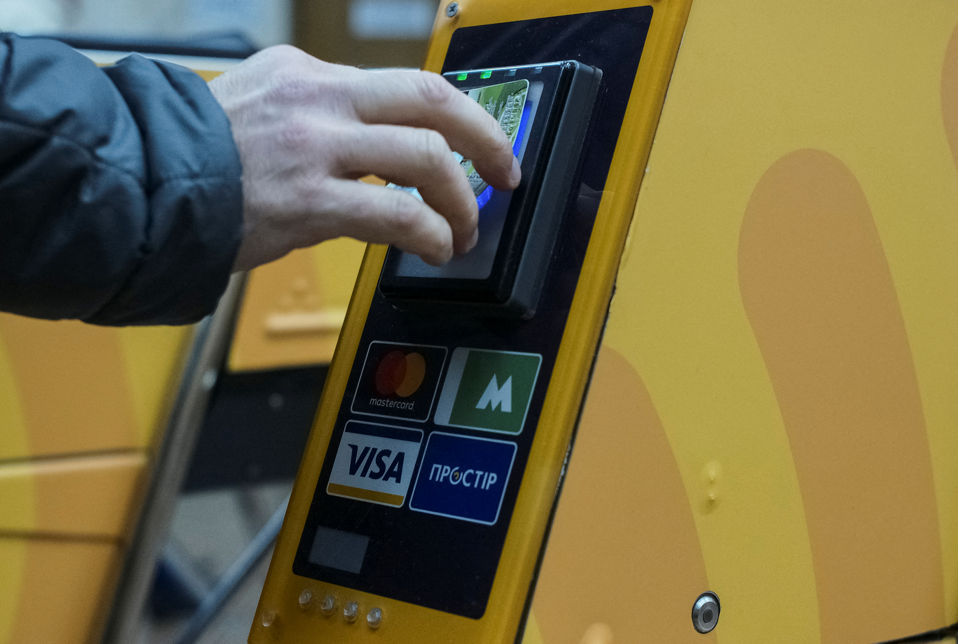 British watchdog sets out plan to shine a light on card payments | Reuters