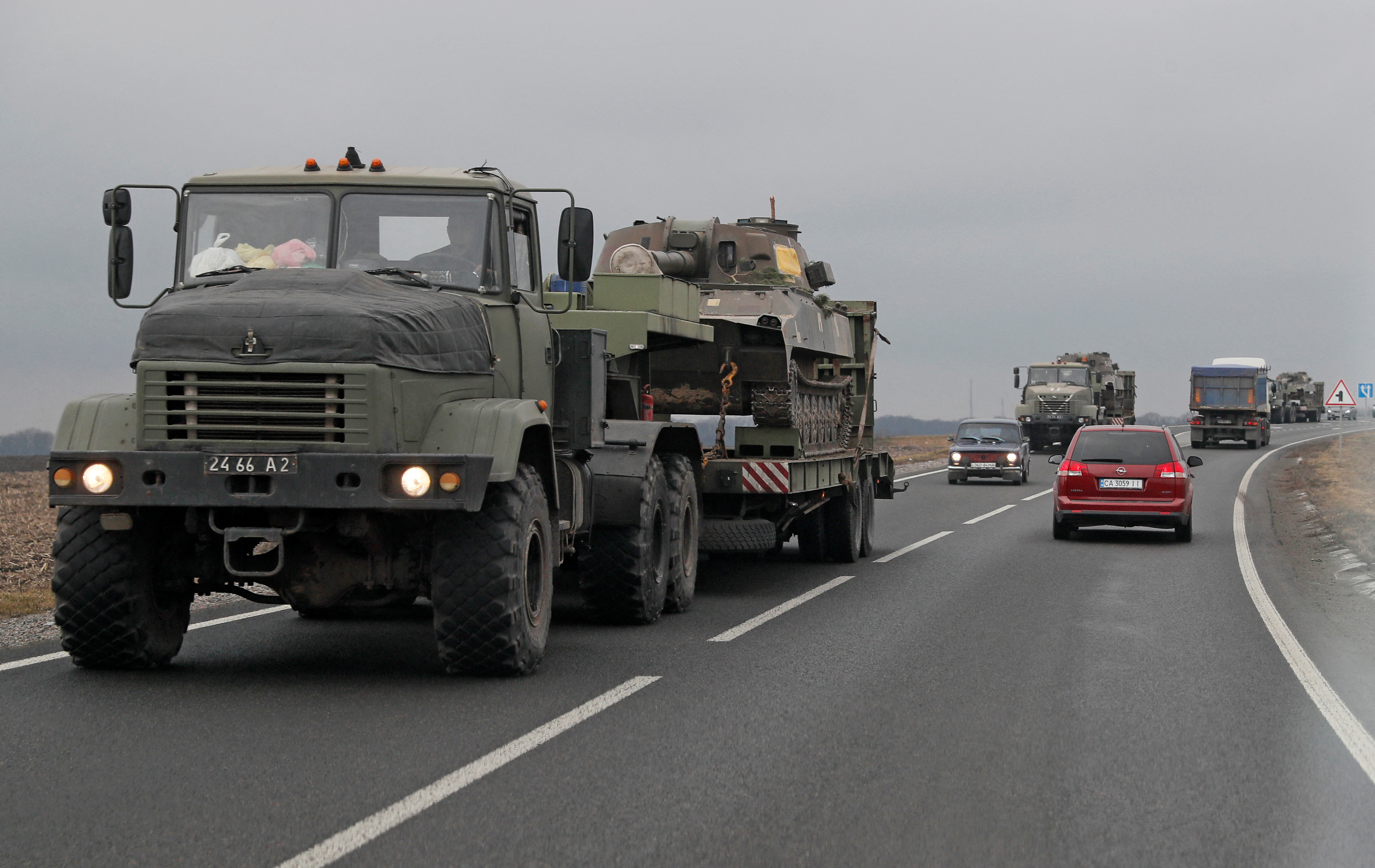 Trucks of the Ukrainian Armed Forces transport armoured vehicles in the Kyiv region