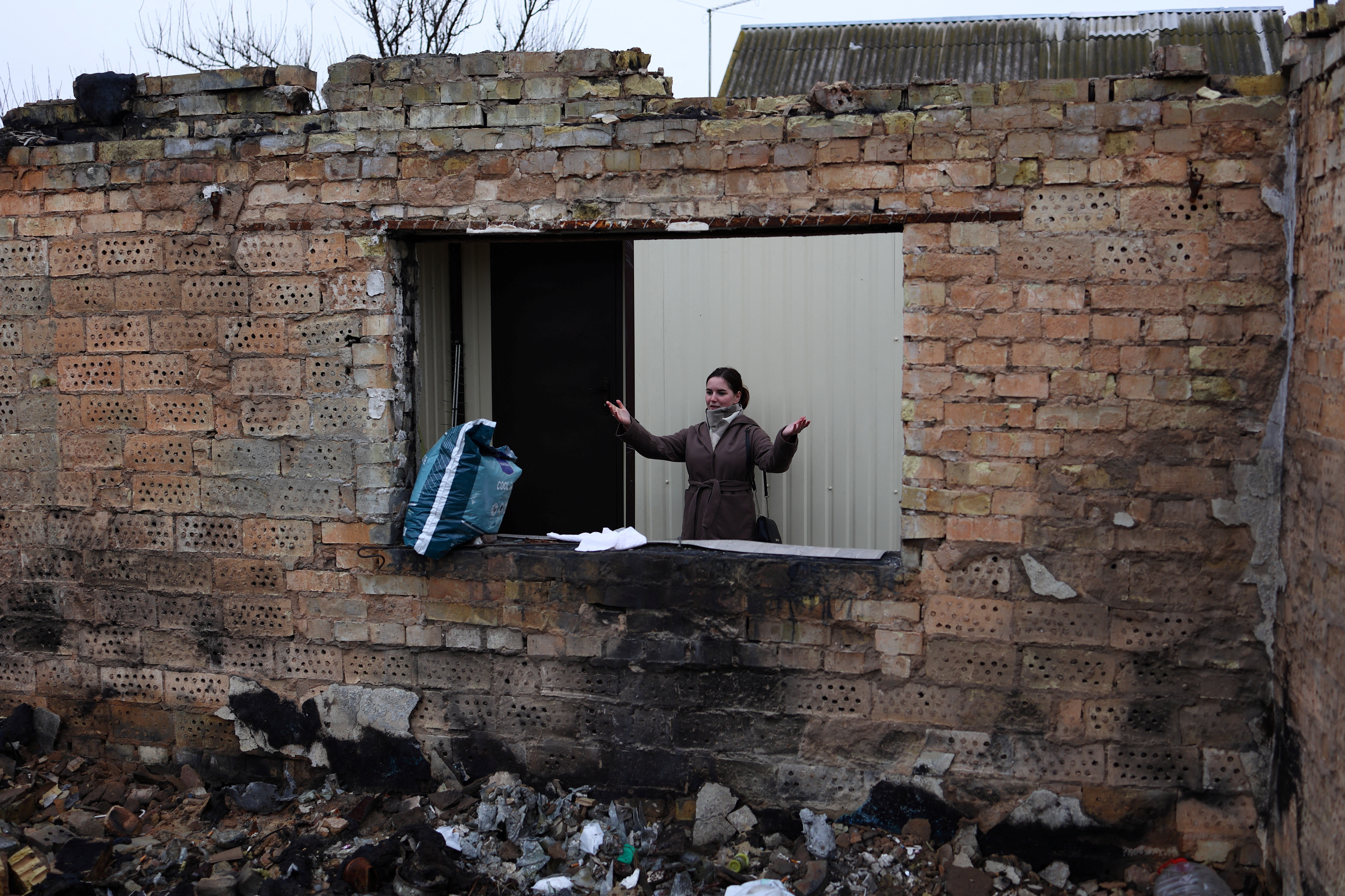 Outages hit family living in the bombed out village near Kyiv