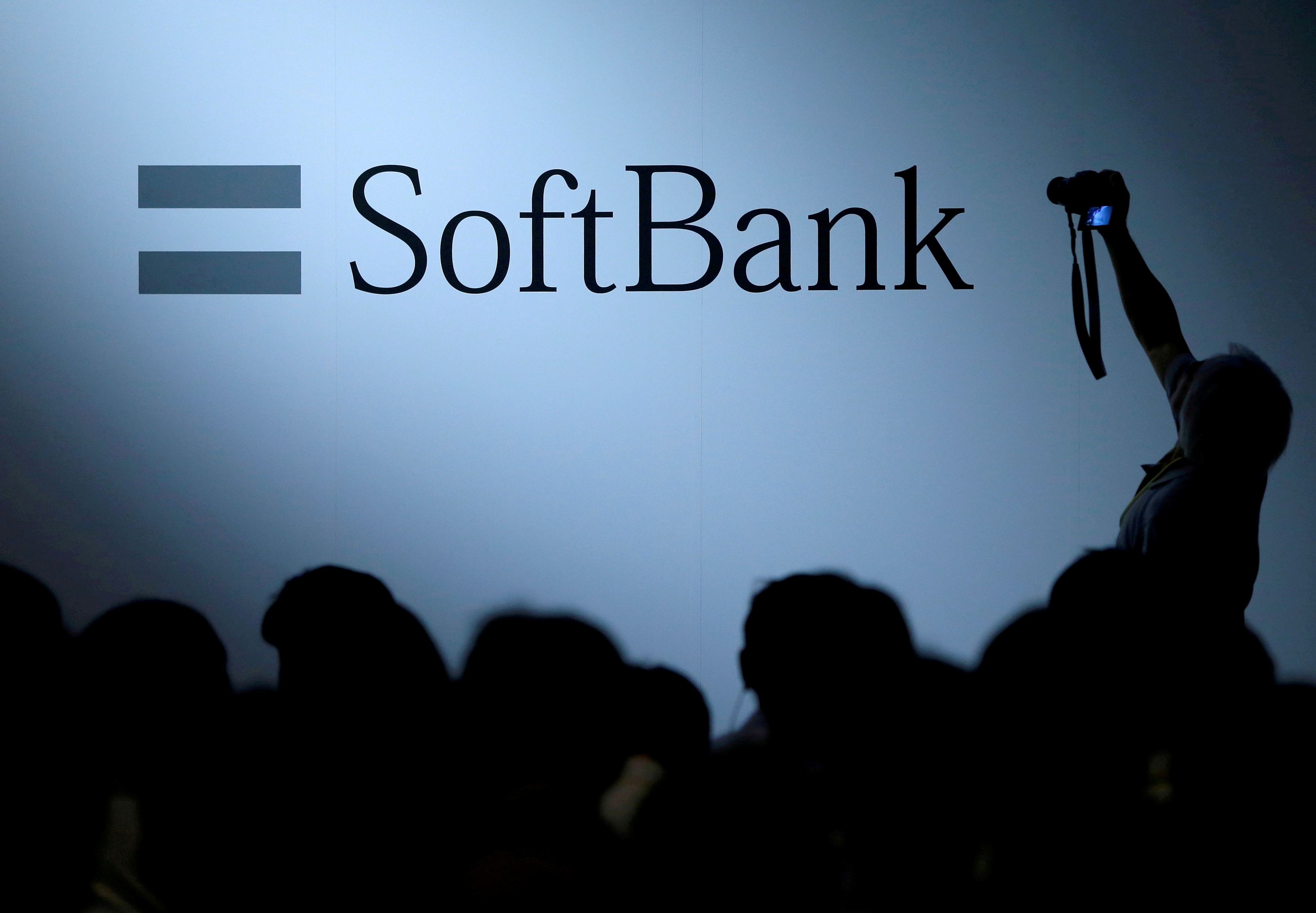 The logo of SoftBank Group Corp is displayed at SoftBank World 2017 conference in Tokyo, Japan, July 20, 2017. REUTERS/Issei Kato/File Photo